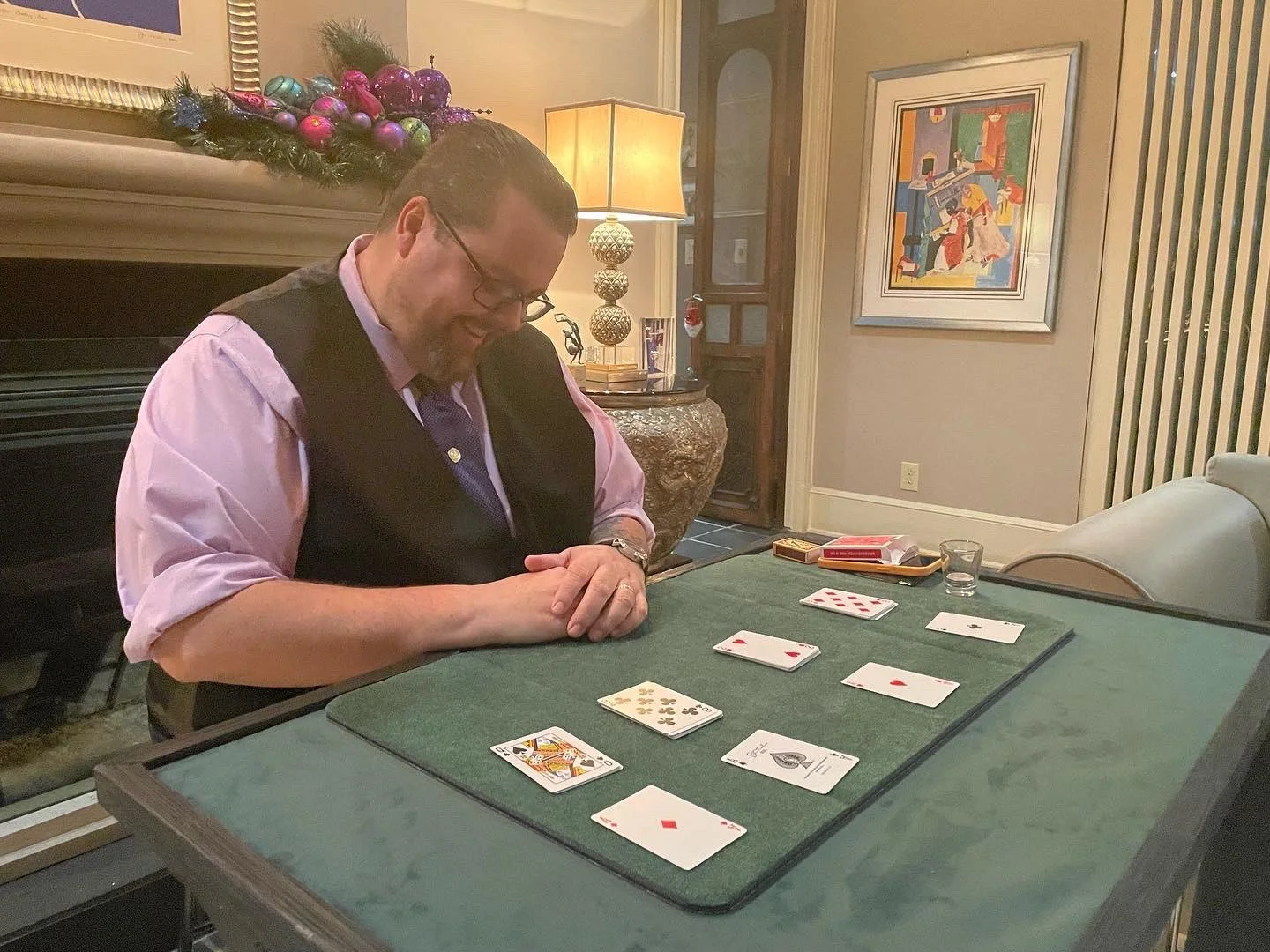 Jeff Walsh laughing at joke made by a spectator during his close up magic show at Clarise Tinsley's birthday private event
