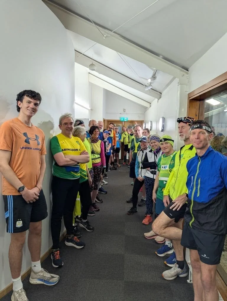 members of the adult Tuesday night club run wearing hi viz running kit