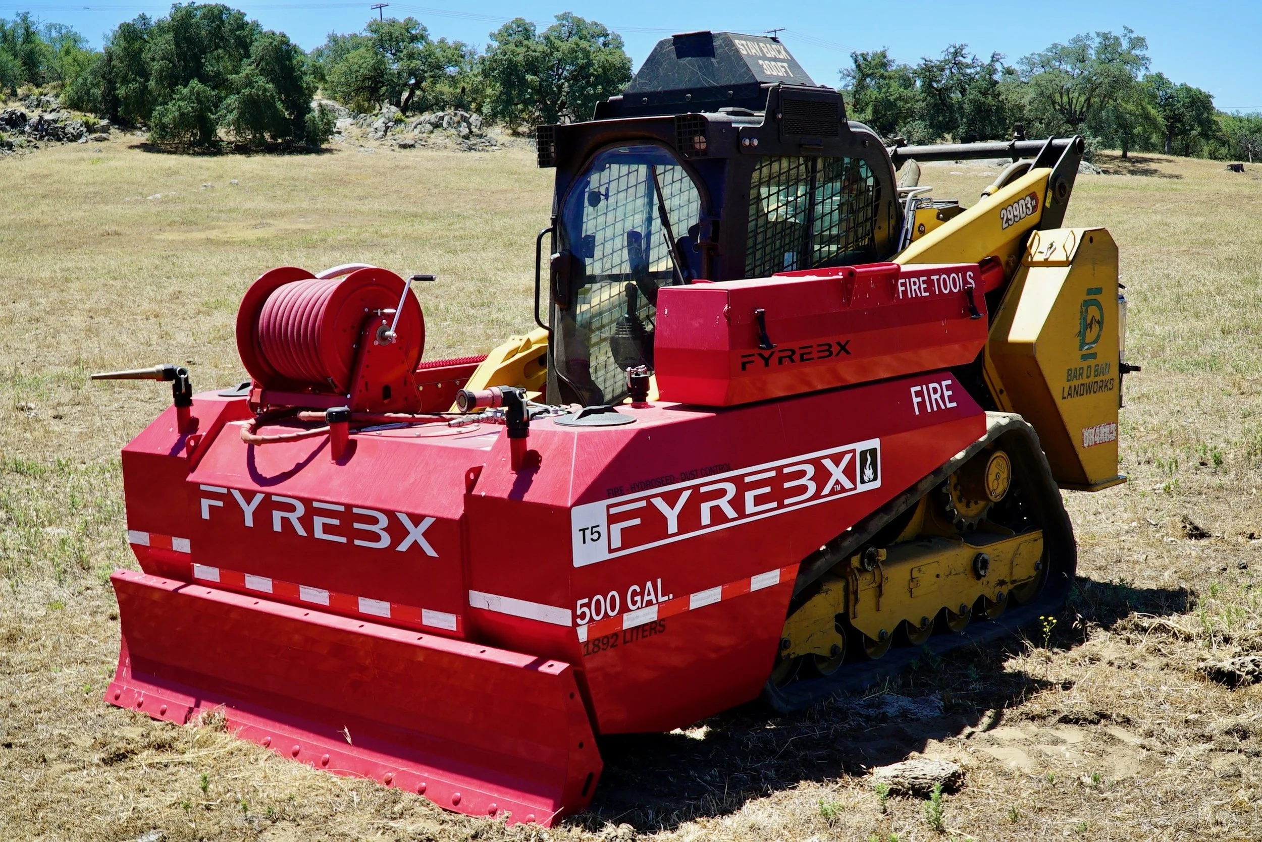 skid steer with fyrebx attachment fire suppression