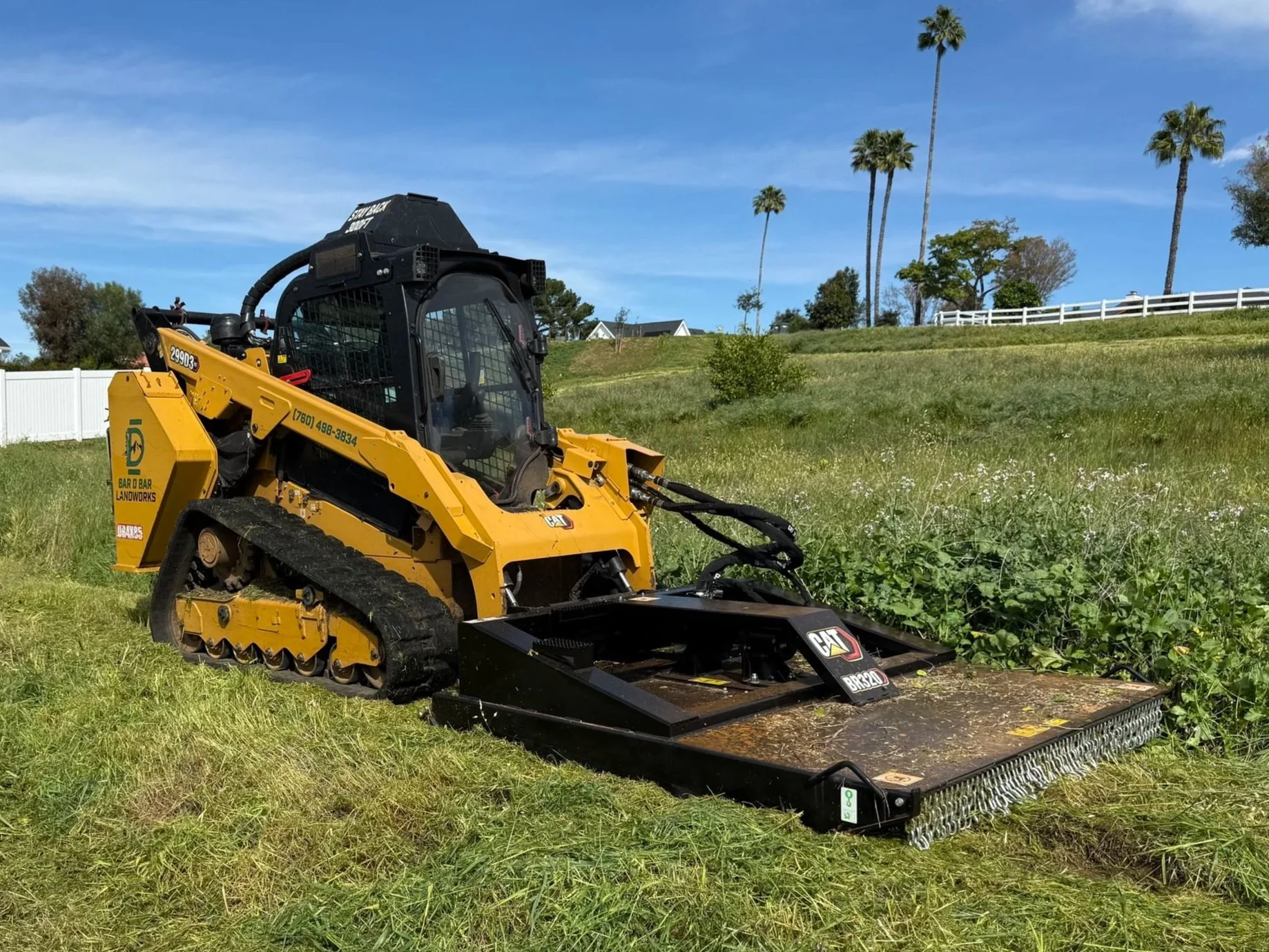 mulch forestry mulching masticator defensible space wildfire protection weed abatement brush clearing mowing removal San Diego county land California North east county tractor caterpillar 299