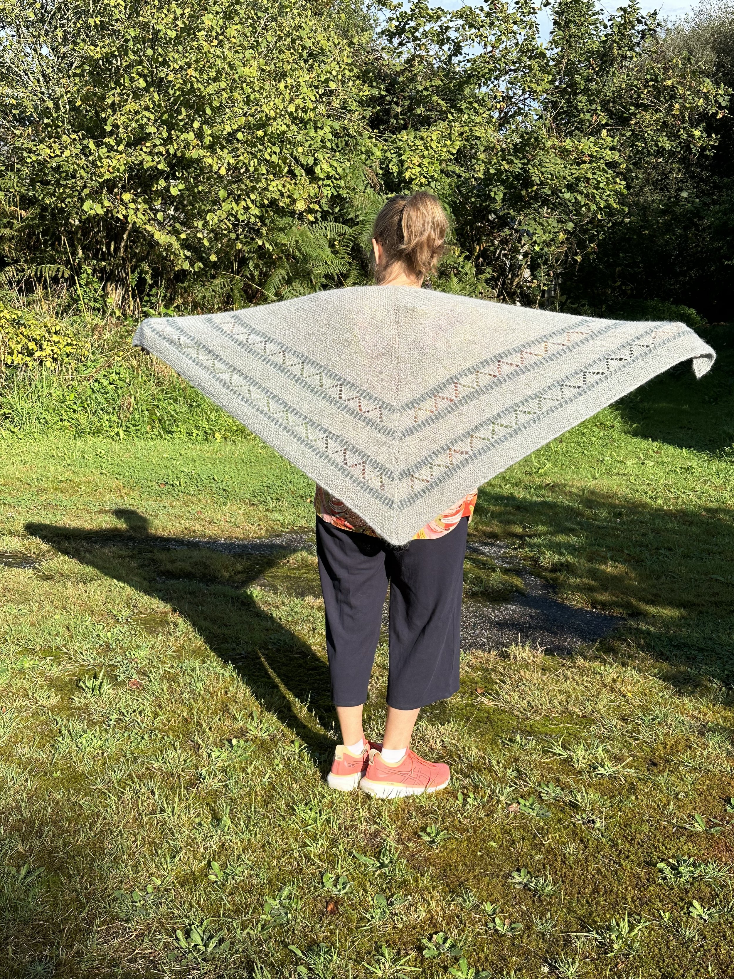 Michelle knit "It Brings You Peace" by Joji Locatelli with Suri/Silk in Lamb's Ear and Blue Spruce.