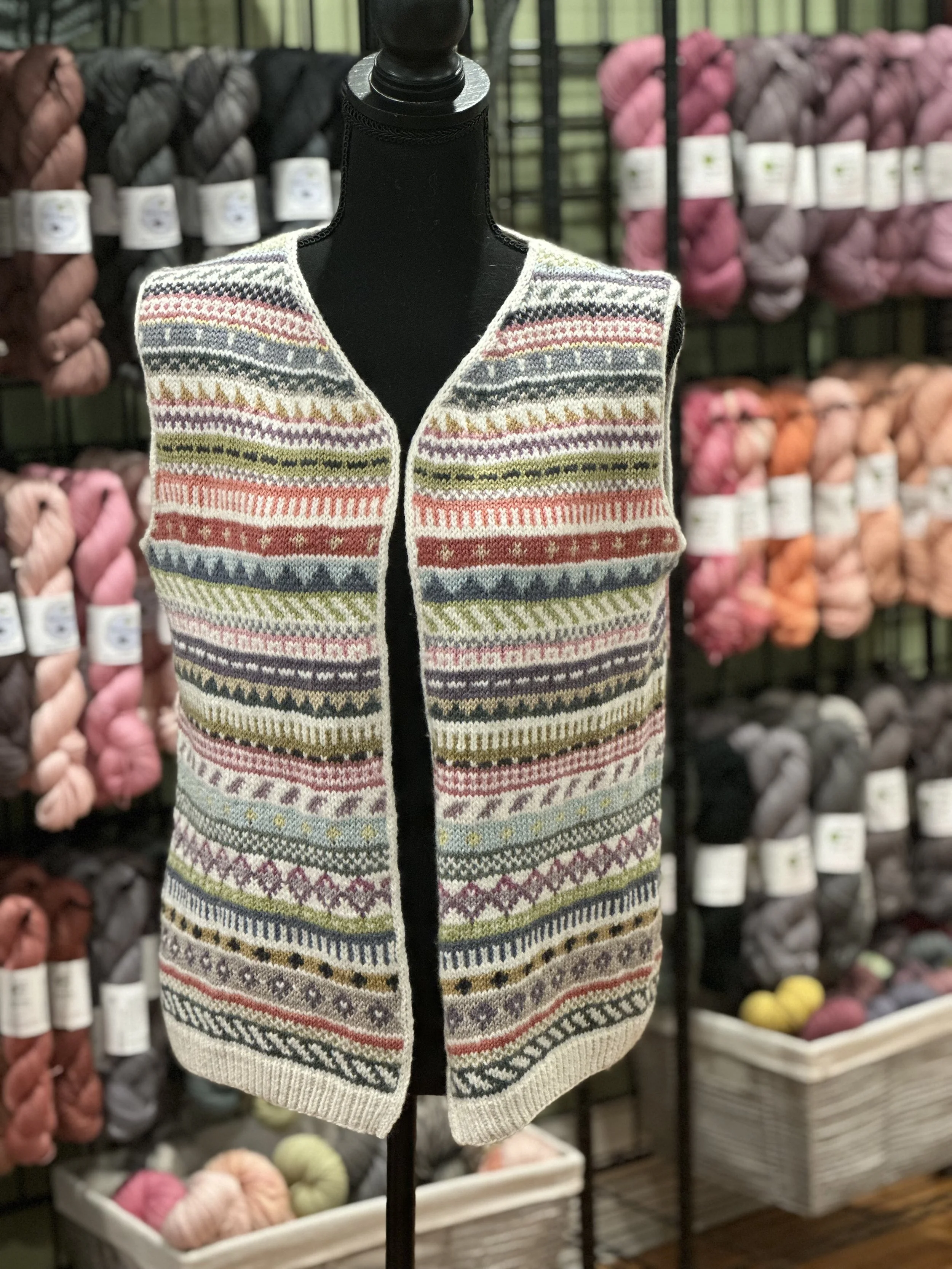 Michelle knit the Voyage (as a vest, the cardigan is by Wool&Pine) using 24 mini skeins in MCN and Pure Merino Fingering