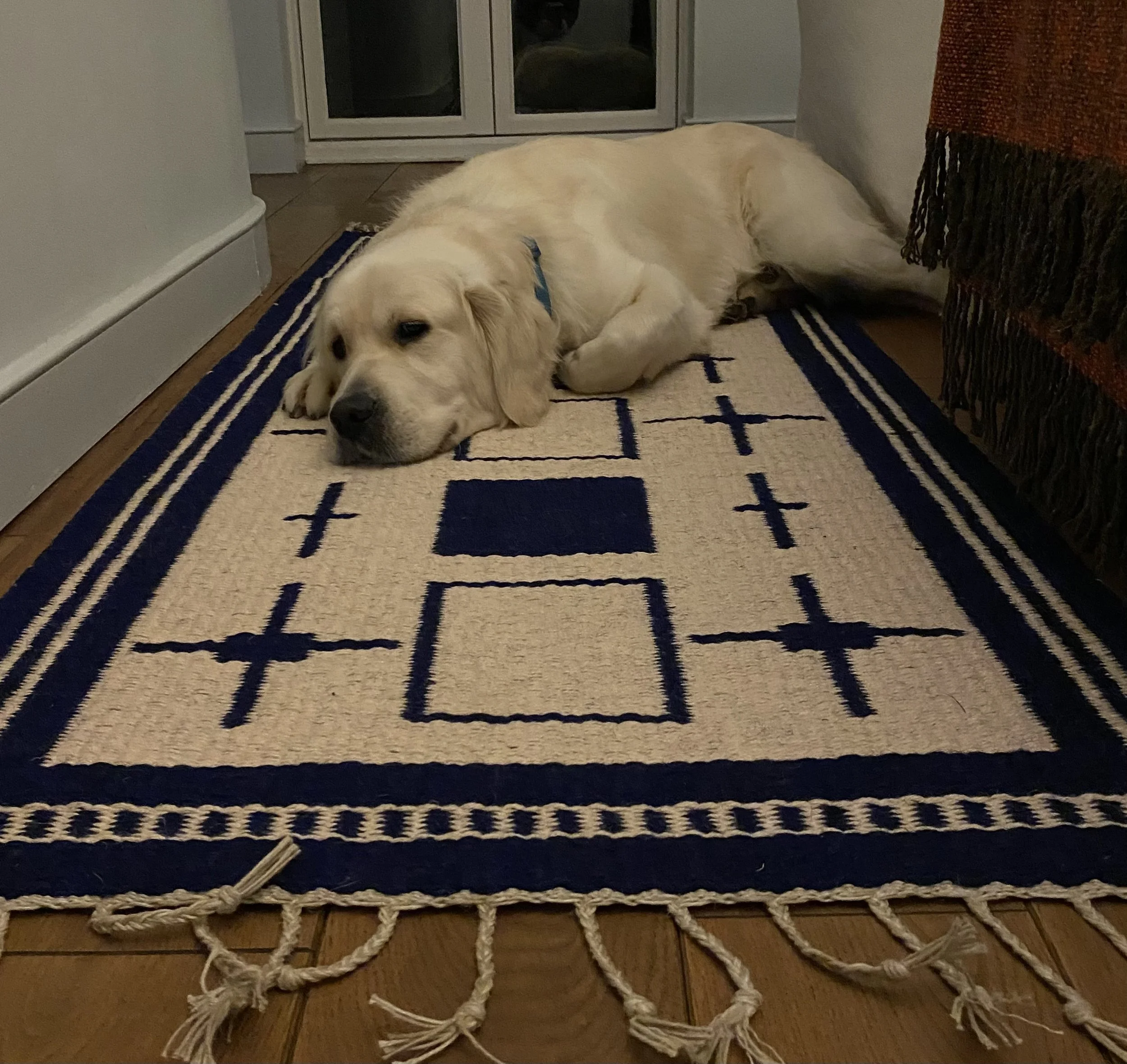 the warmth of a handwoven rug - Michael Madden