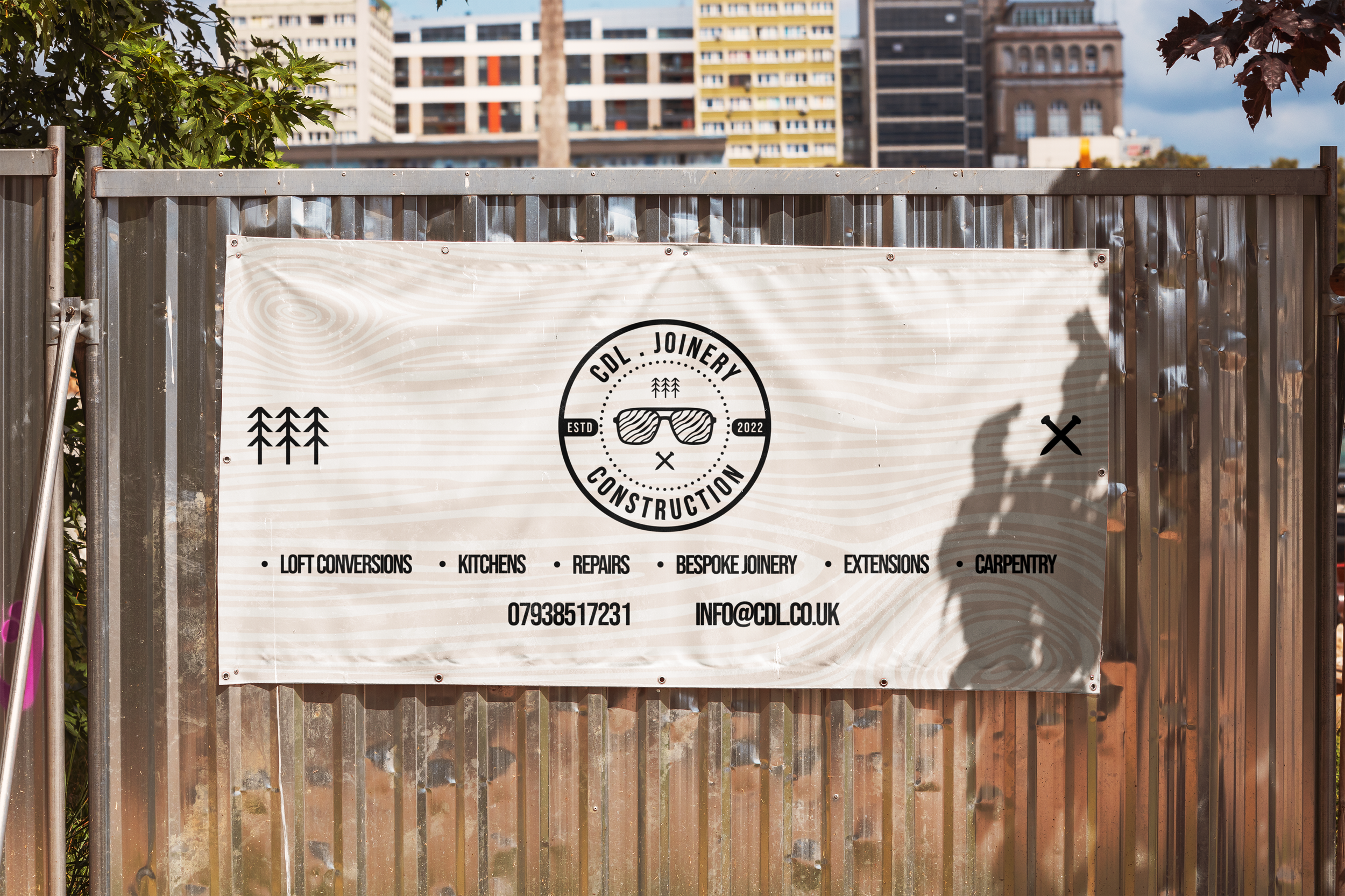 CDL - Banner_on_Construction_Fence.png