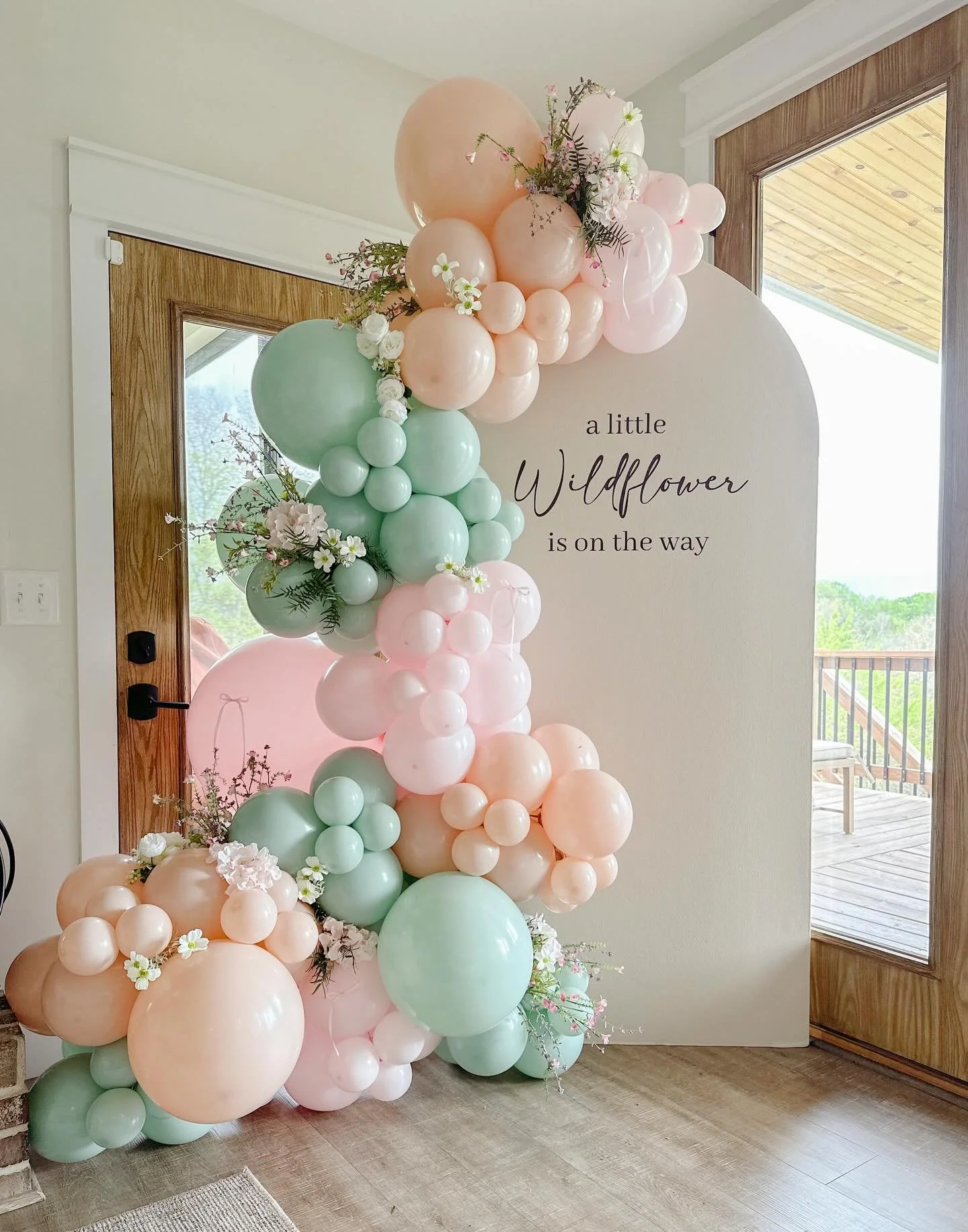 The sweetest little wildflower is on the way 🌸 honored to help celebrate our clients through every beautiful season. Loved bringing this dreamy spring setup to life✨