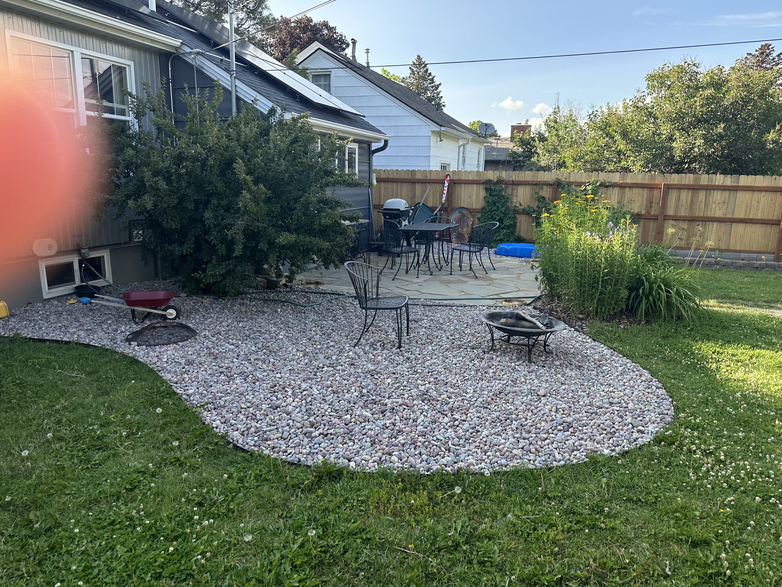 Rock and flagstone patio in a backyard in Bozeman, MT