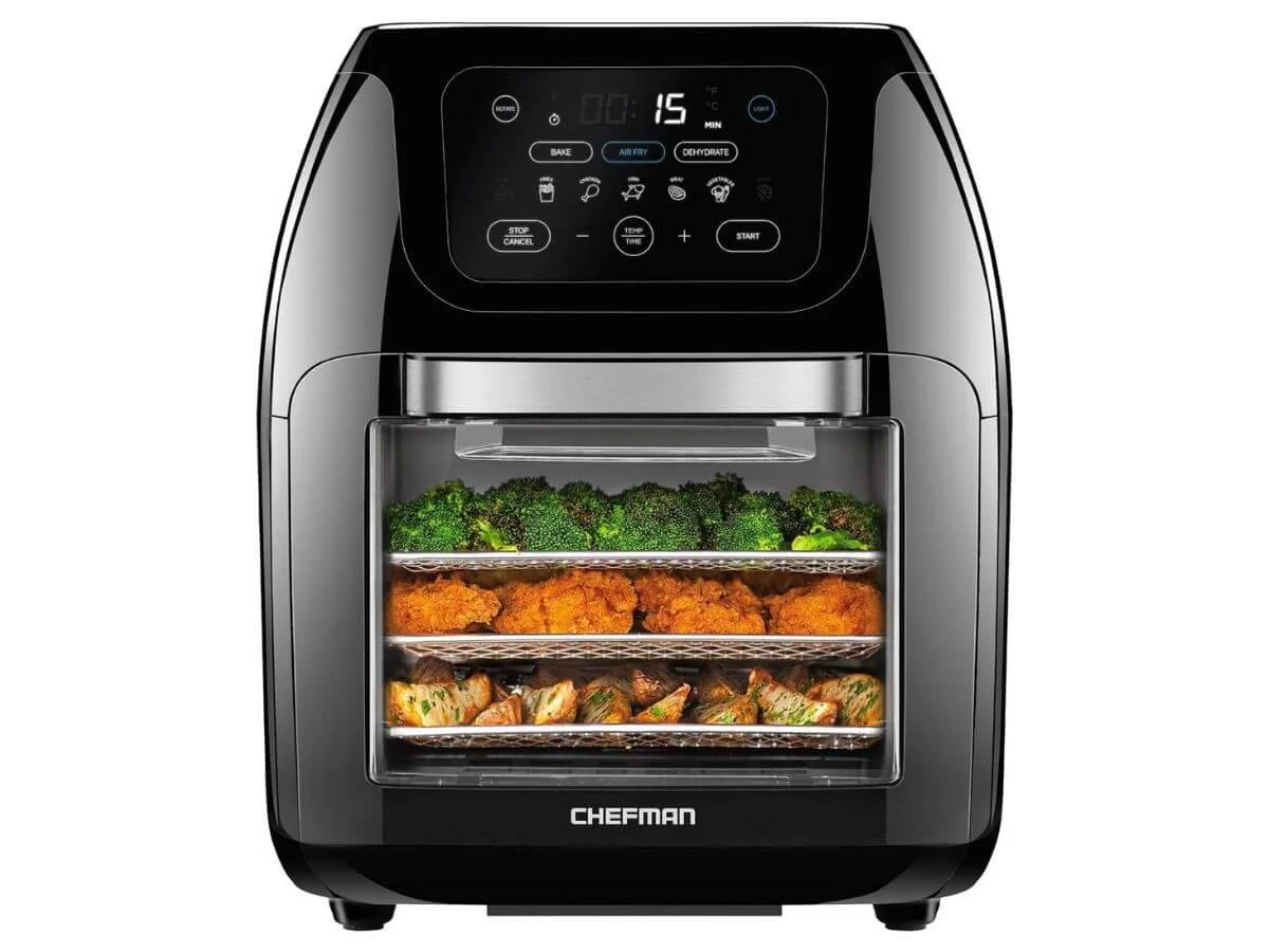 Countertop air fryer oven with digital controls and multiple cooking trays.