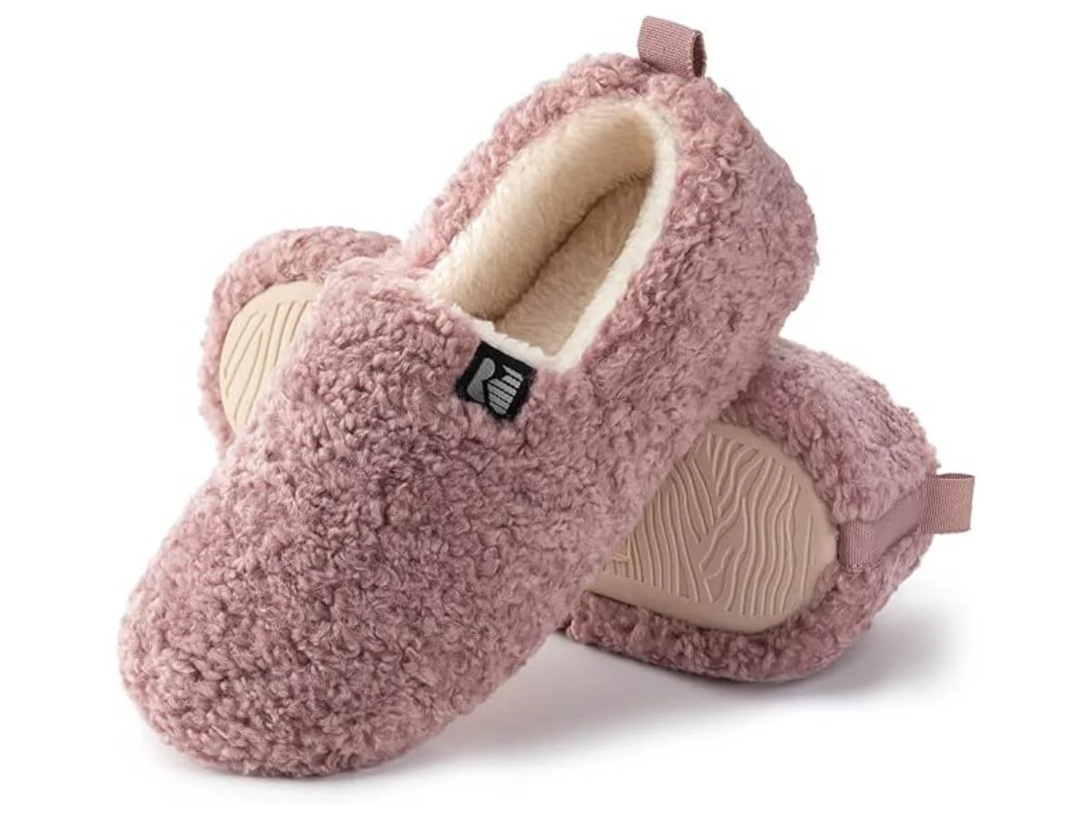 Pink plush memory-foam house slippers with soft fleece lining and non-slip sole.