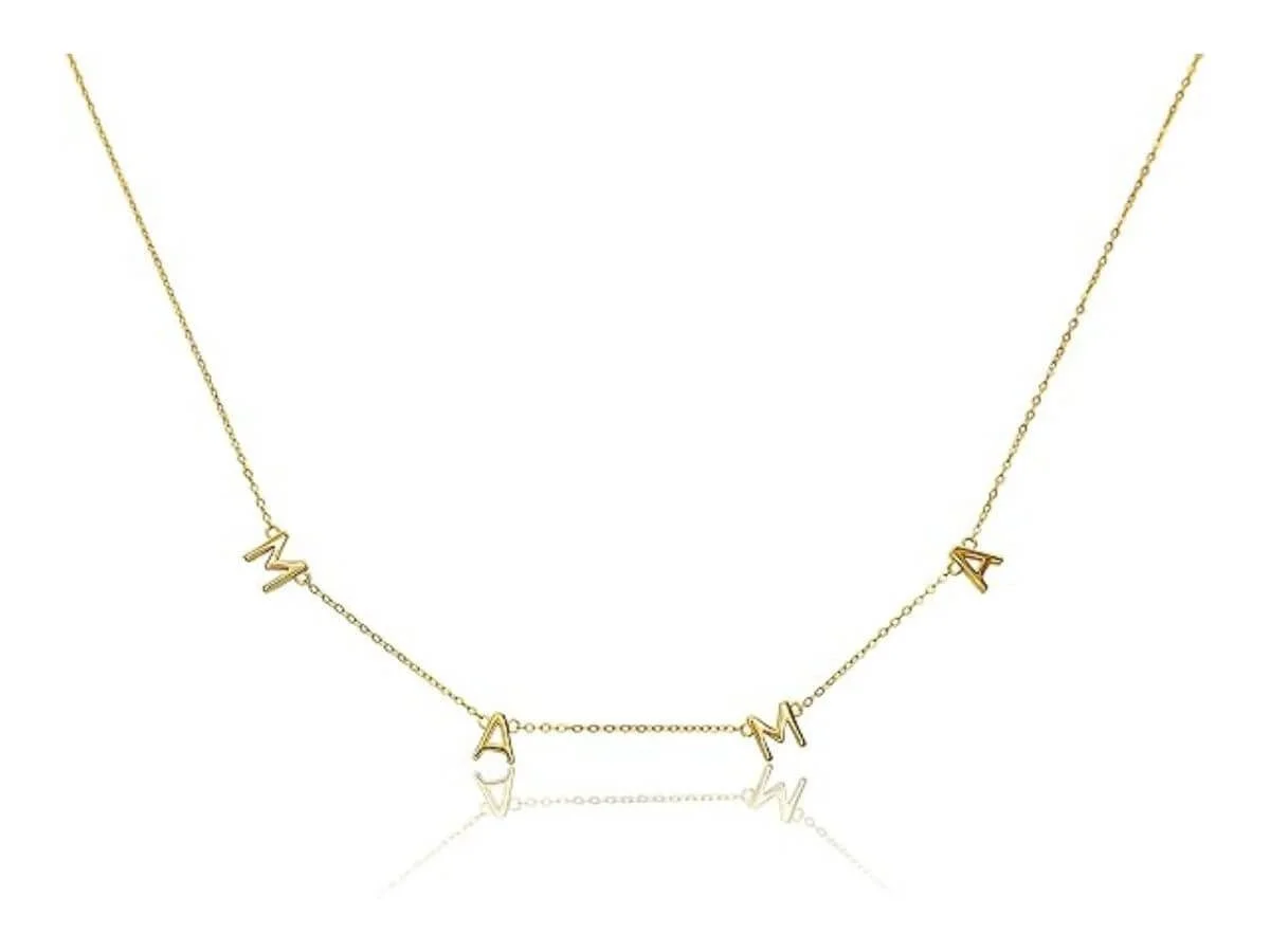 Delicate gold “Mama” letter necklace on a thin chain.