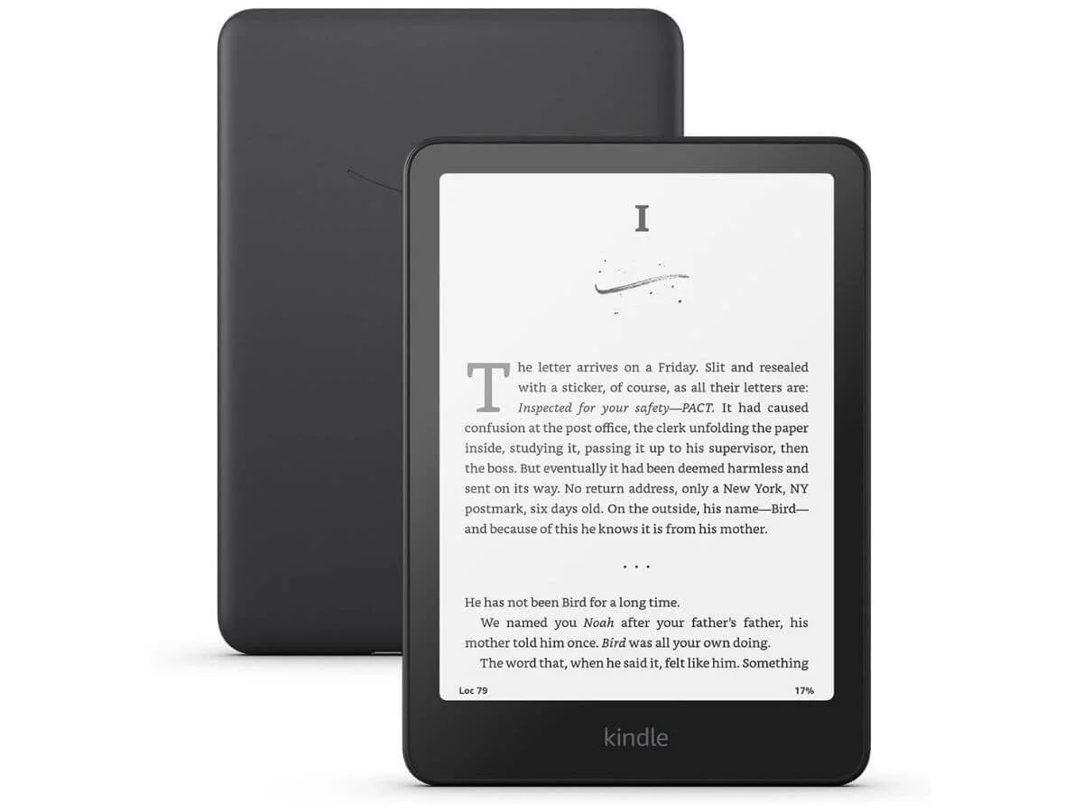 Kindle Paperwhite e-reader displaying a book page on the screen.