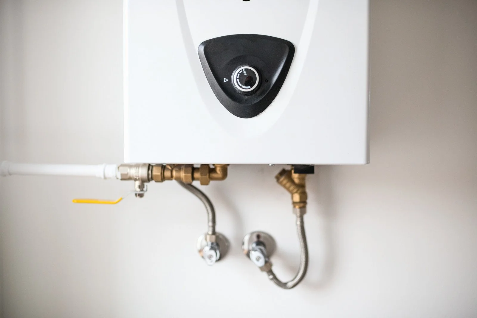 close up of tankless heater heat exchanger with mineral scale buildup