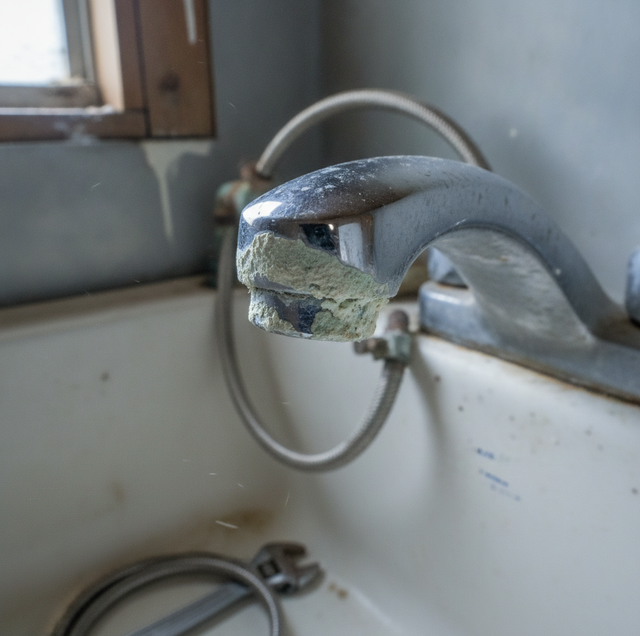 glass with white mineral spots on counter