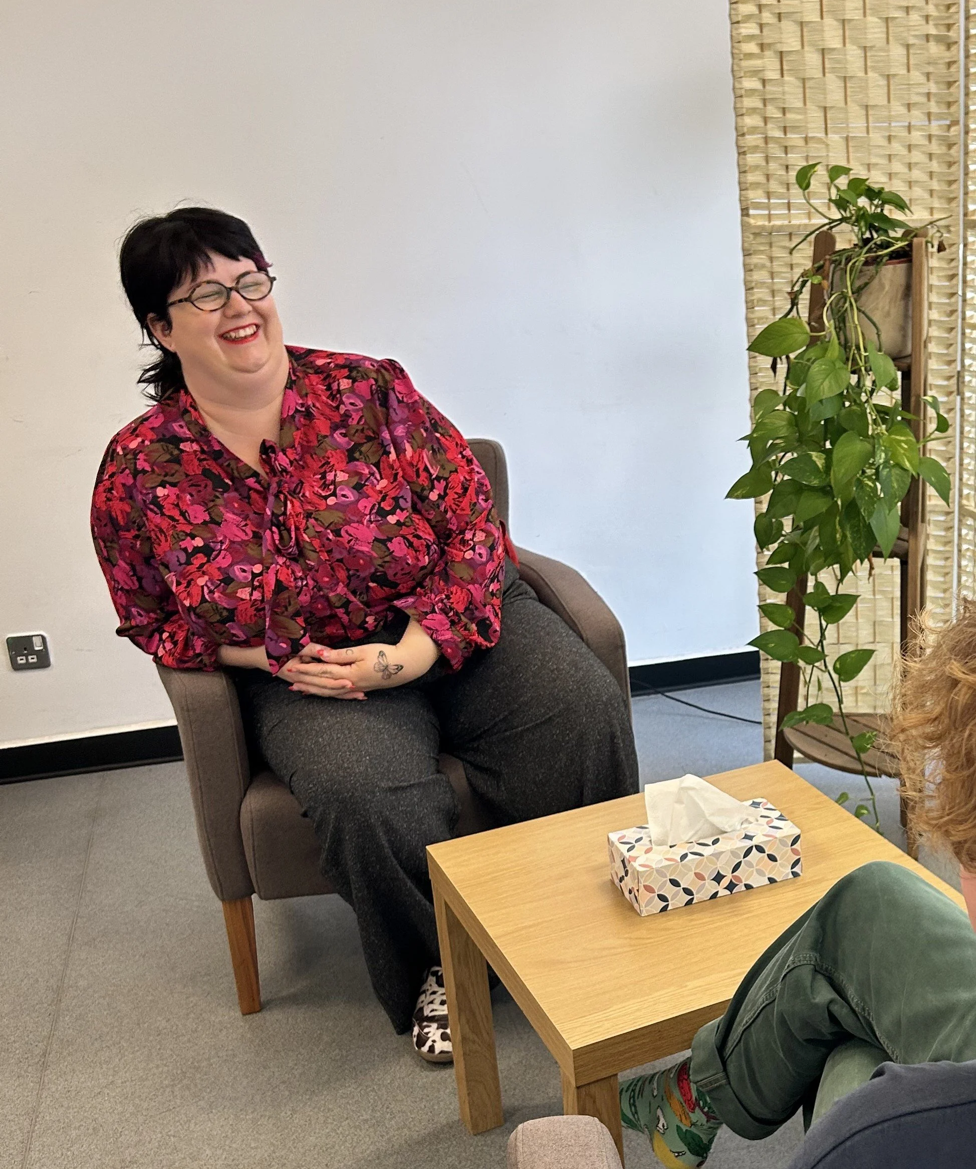 Therapist Kelly Megan giving a therapy session