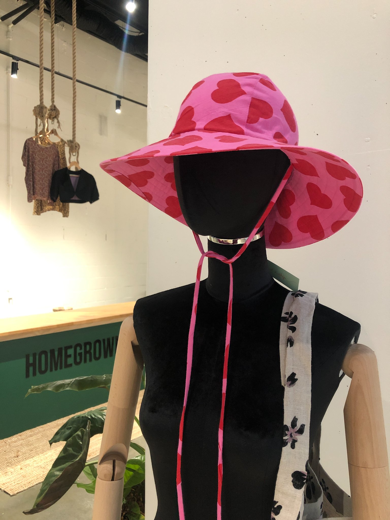 Mannequin wearing a handmade and up-cycled fabric sun hat