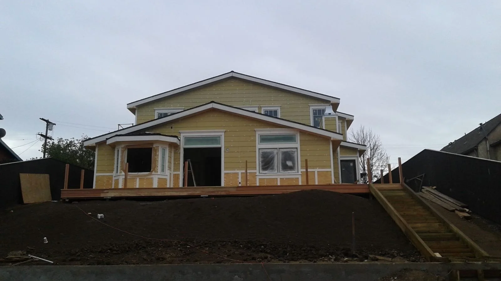 New Home Construction Siding.jpeg