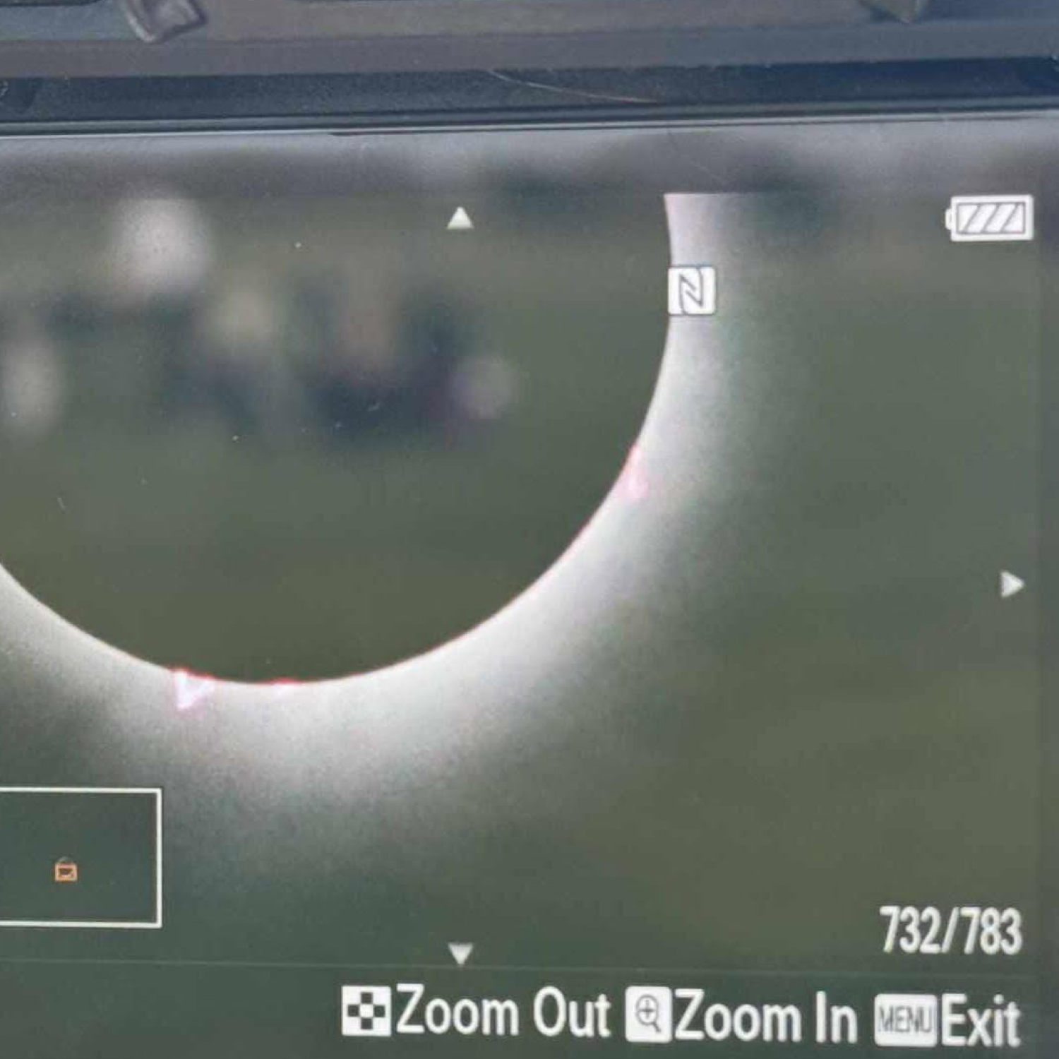 Solar eclipse displayed on a handheld video game screen