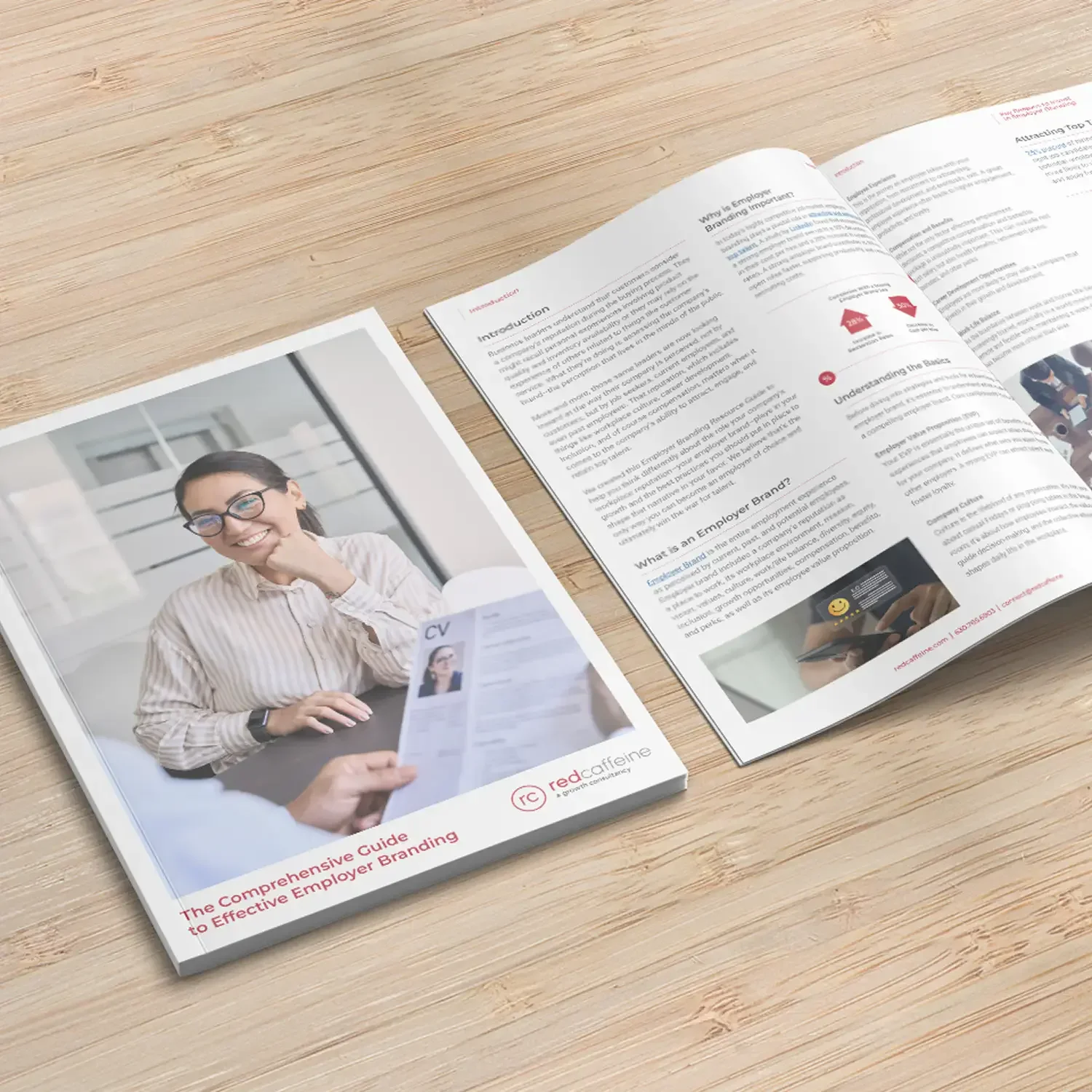 Corporate compliance brochure spread on a wood table