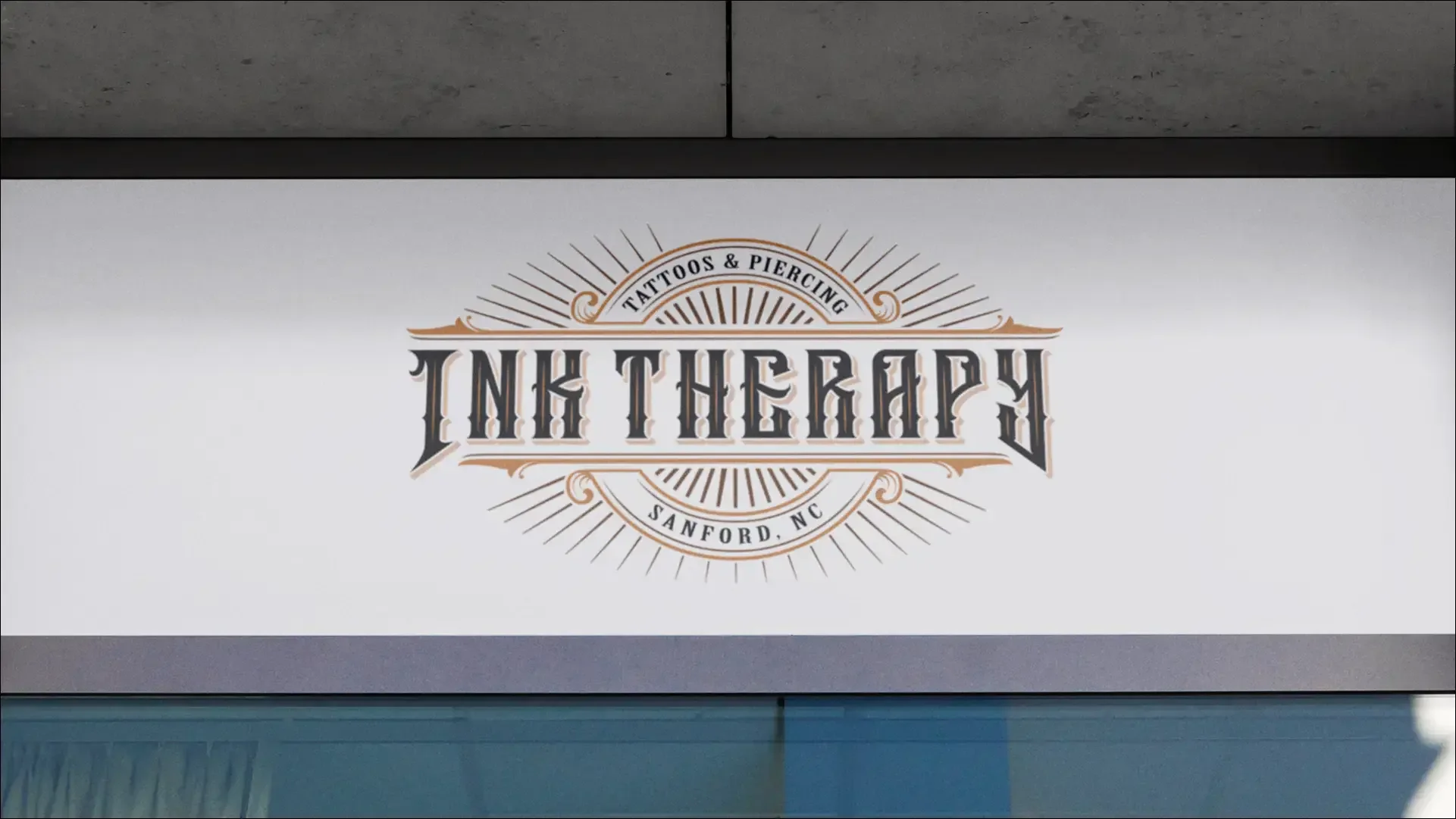 Ink Therapy tattoo studio storefront sign and logo