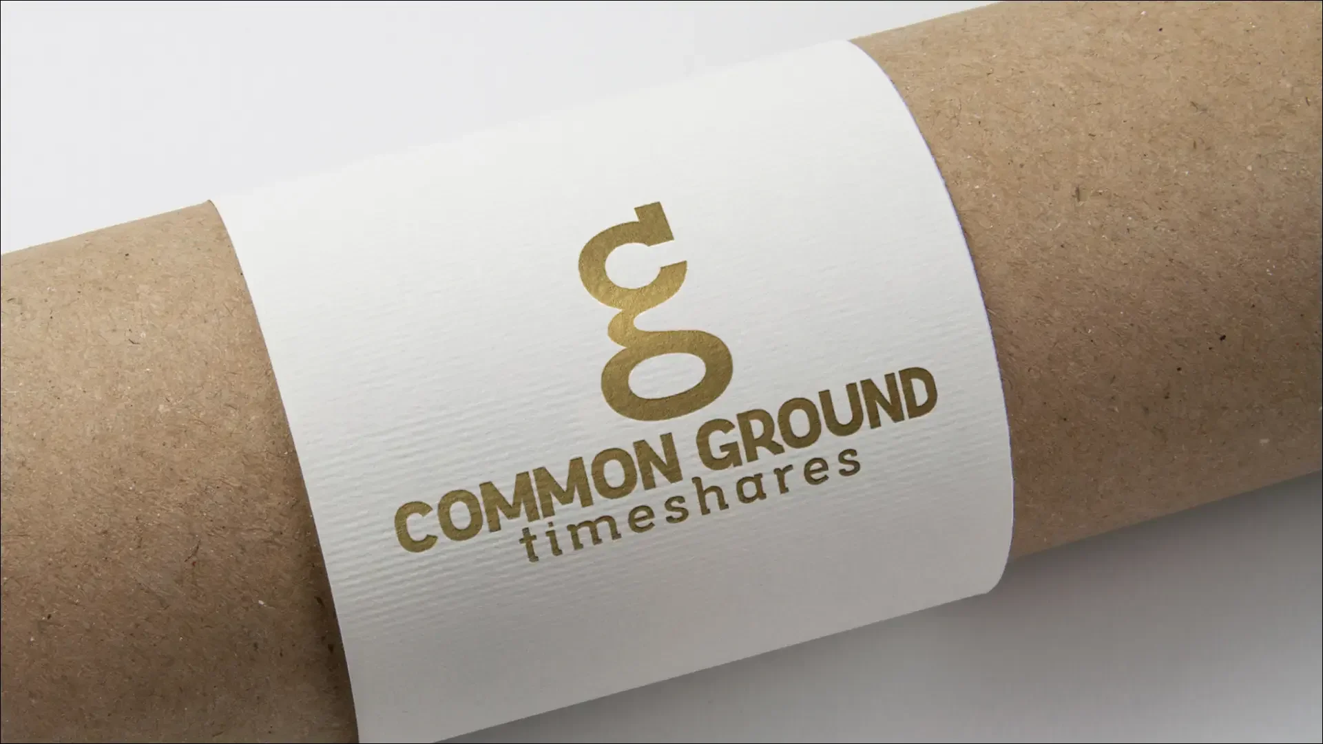 Common Ground Timeshares logo printed on a paper package.