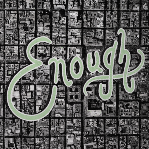 Street art graffiti of the word 'Enough' in cursive, green letterings on a black and white grid background.