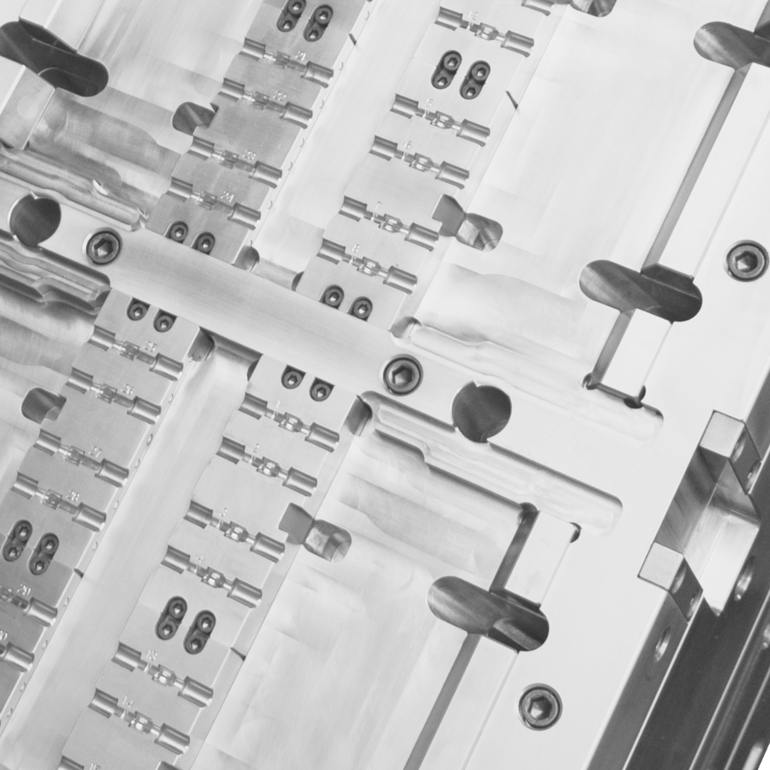 Clear product packaging components arranged on a worktable