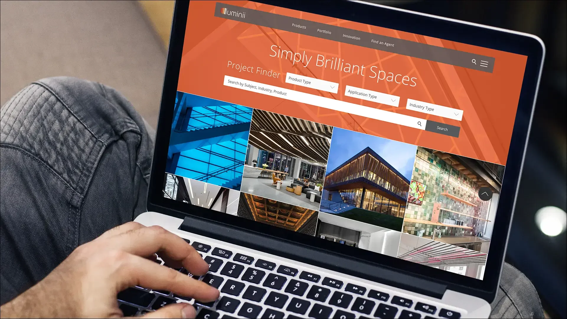 Architectural project website displayed on laptop