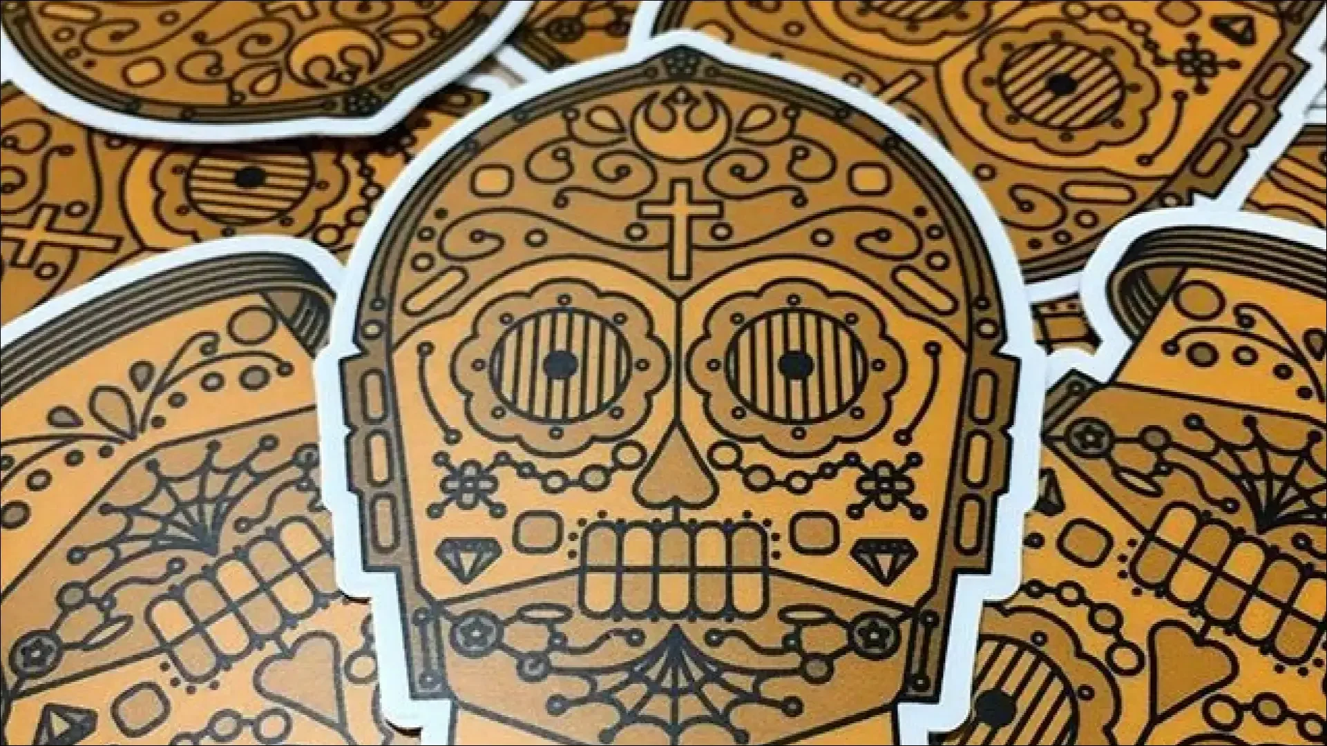 Gold sugar-skull sticker illustration