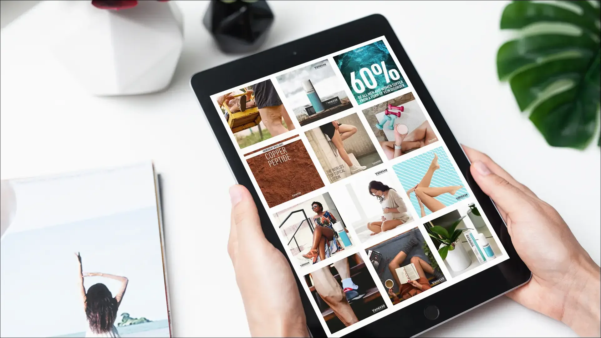 Person holding a tablet displaying a grid of fashion, beauty, and wellness products.