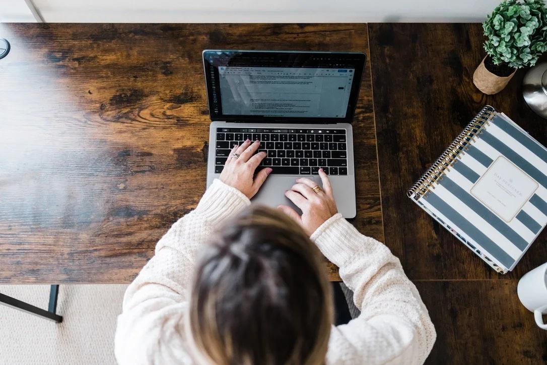 Virtual assistant Magen simplifies small business document on laptop