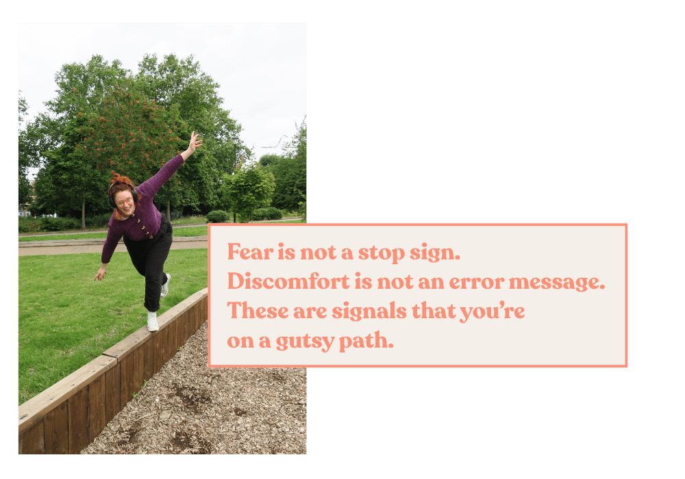 Susannah balances playfully on a low playground wall in a park, expressing movement and ease. Text overlay: “Fear is not a stop sign, discomfort is not an error message, these are signals that you're on a gutsy path.”