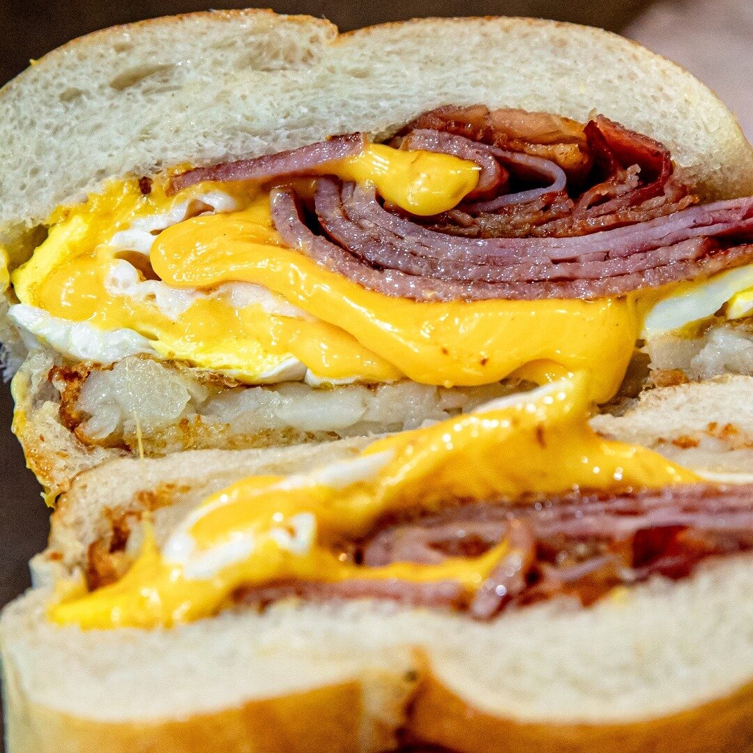 The Triple Pork Belly Buster - a breakfast sandwich that means business. 💼 Two fresh-cracked eggs, pork roll, ham, cheese, and a hash brown are served on a roll to make up a uniquely appetizing BCB experience. 😋