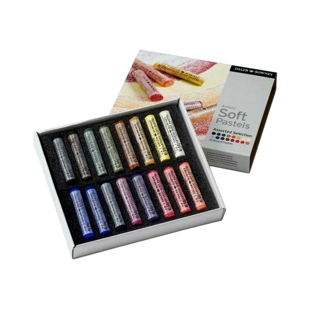 Caja de pasteles suaves de colores variados con envase decorativo.