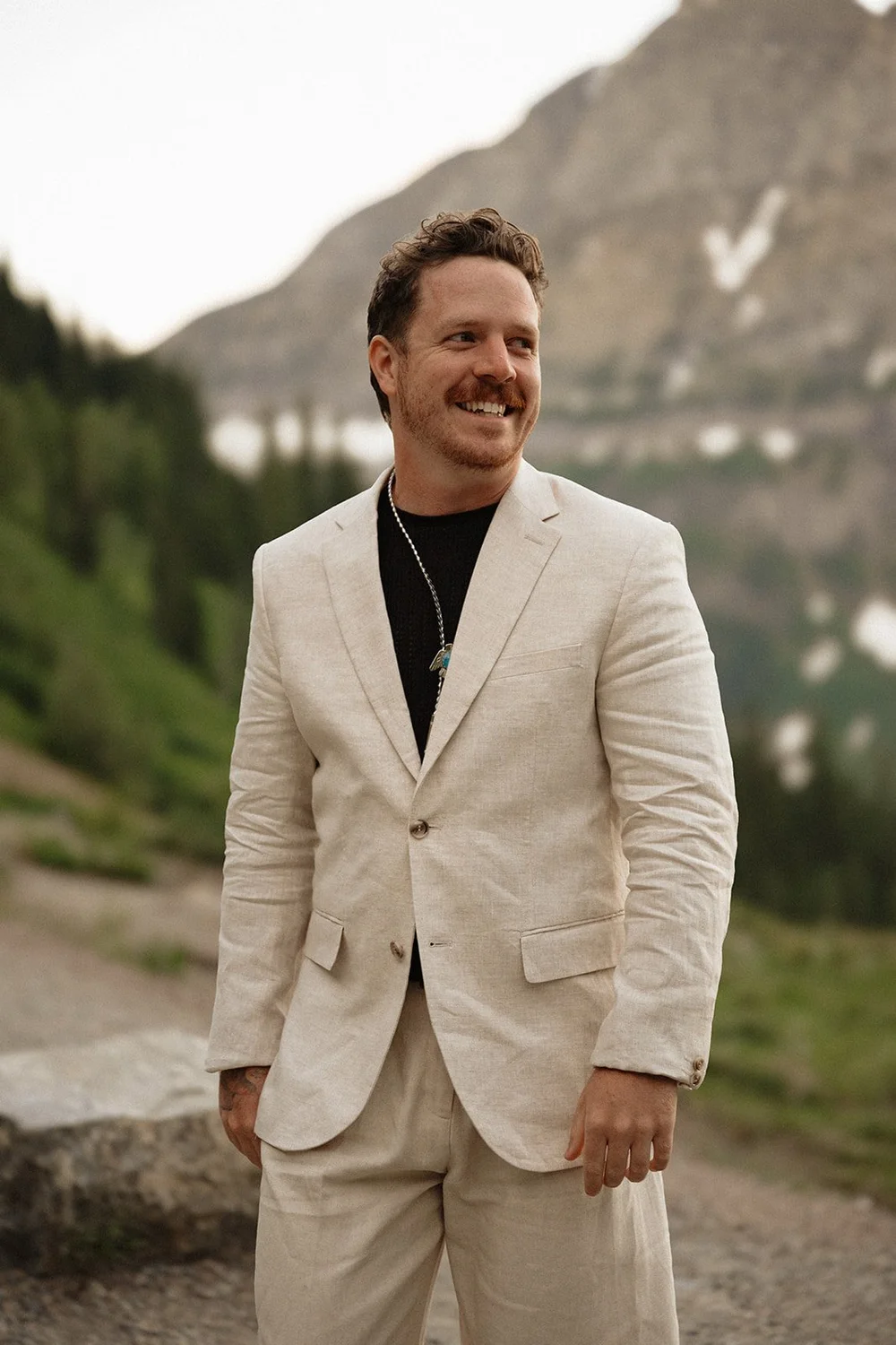 groom gets ready on elopement day