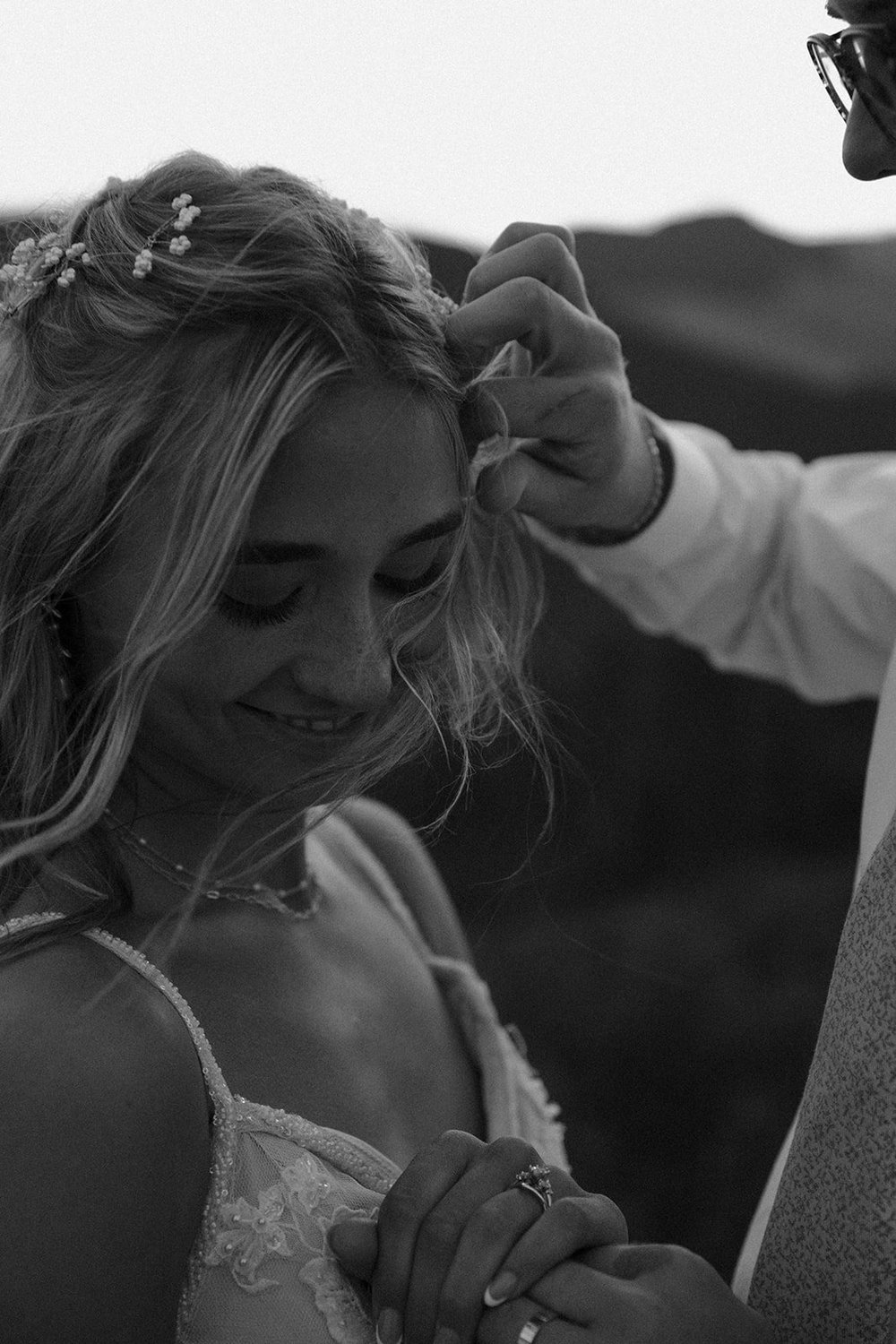couple poses together on wedding day