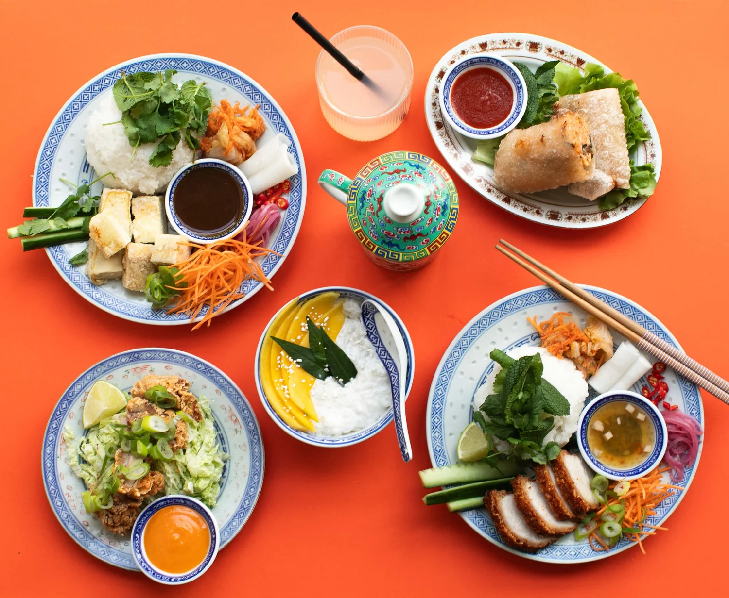 A table filled with Vietnamese dishes from Le Bánh Mì