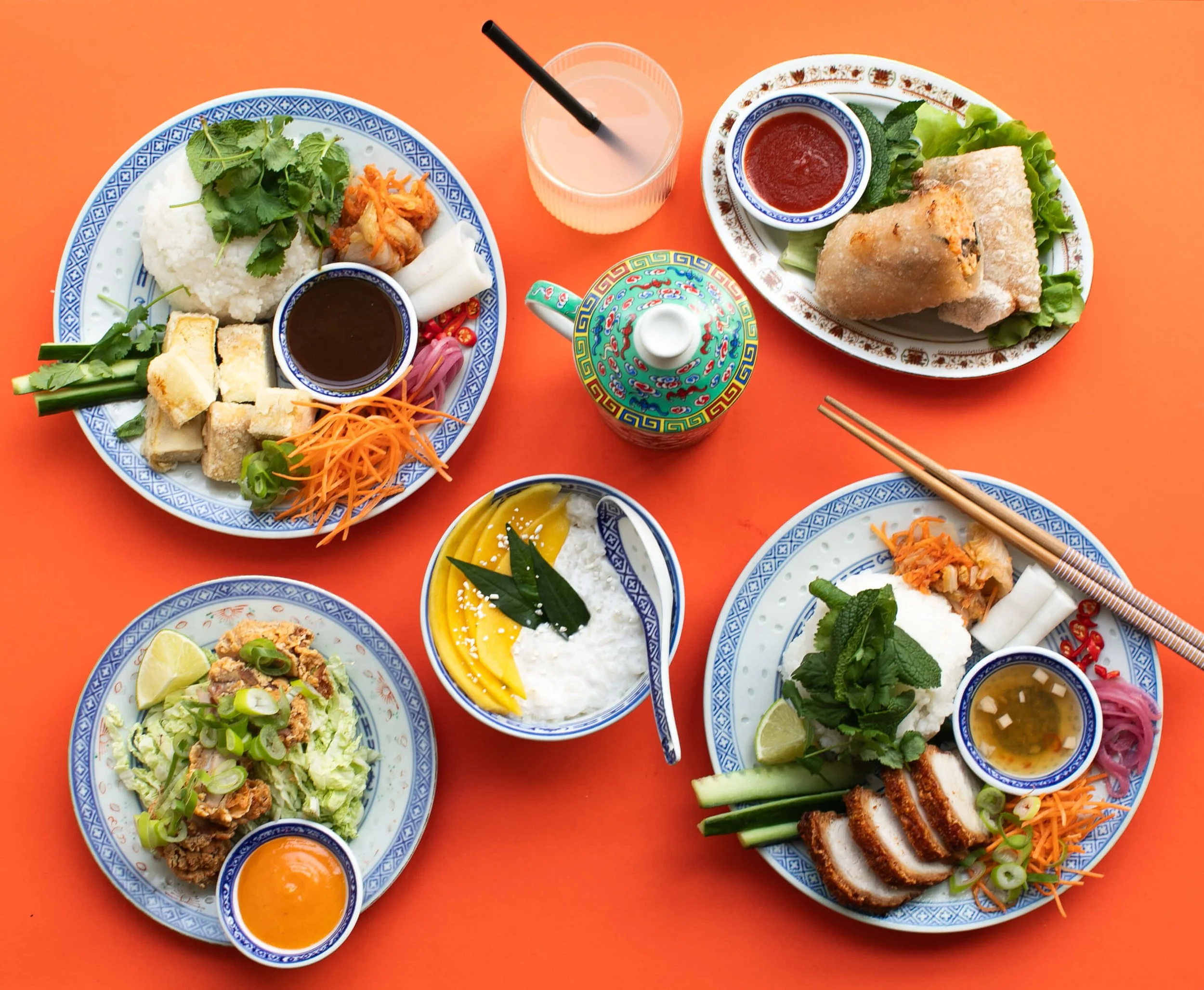 A table filled with dishes from Le Bánh Mì