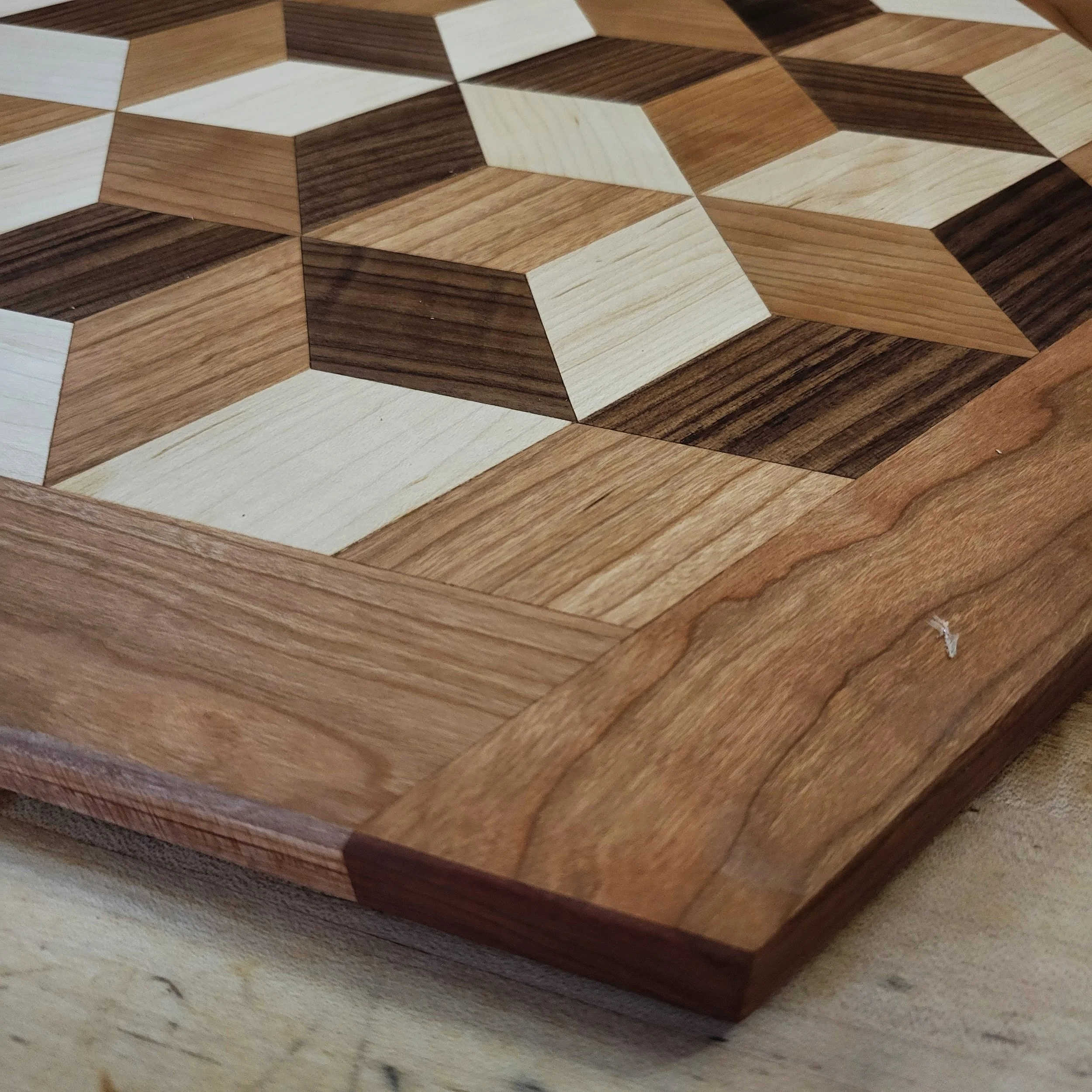 Cherry, Walnut, Maple Stars_Hexagonal Serving Board_Closeup_9-19-26.jpg