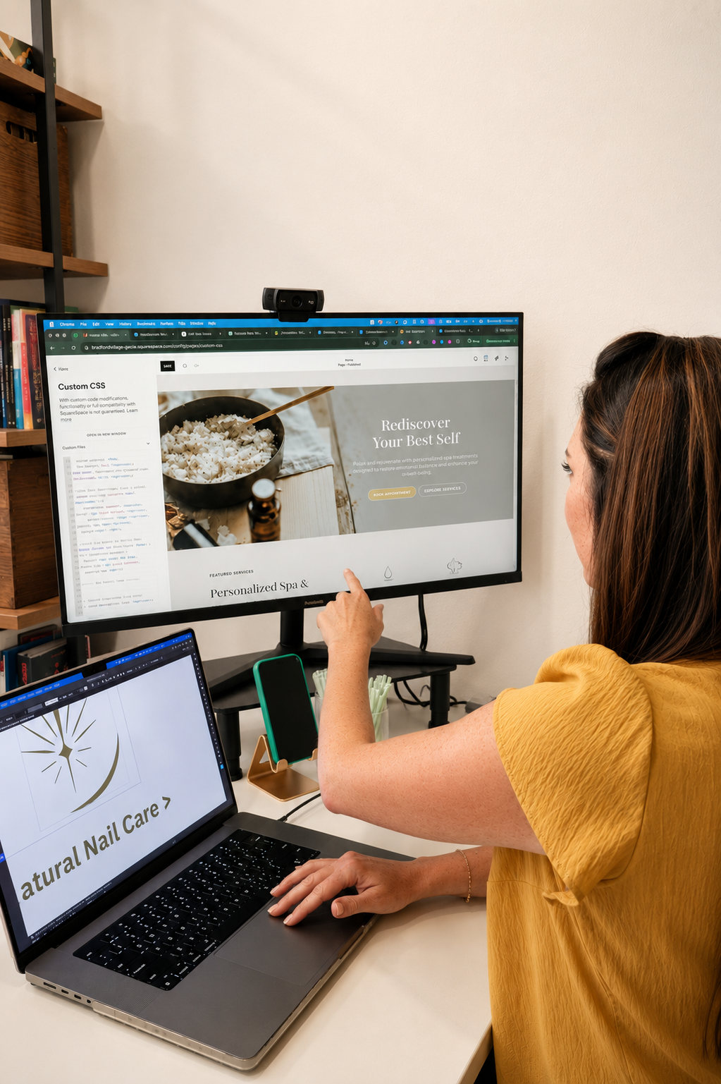 Callie working on a custom website design for a client inside of SquareSpace