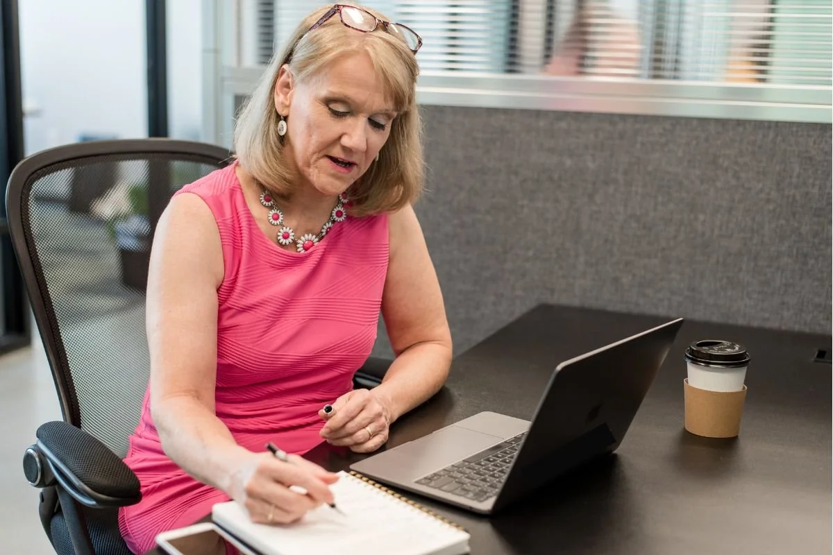 Solo business owner Wendy at desk