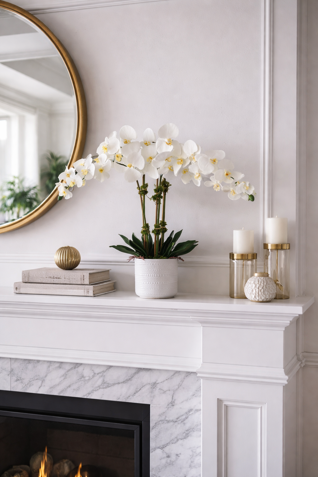 A glass jar filled with moss and twigs holds a bouquet of pink and white flowers, including roses and hydrangeas, on a wooden surface with a plain white wall background.