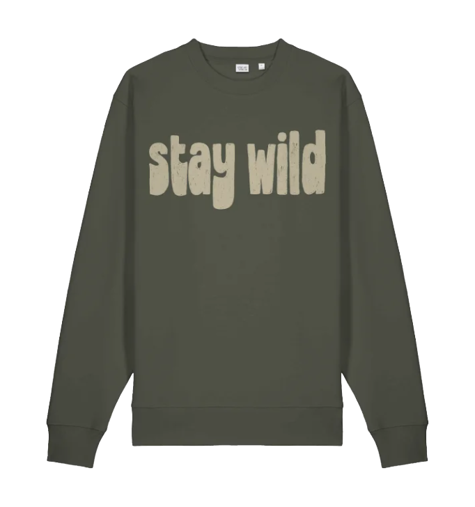 Green sweatshirt with bold beige text that says "stay wild" on the front.