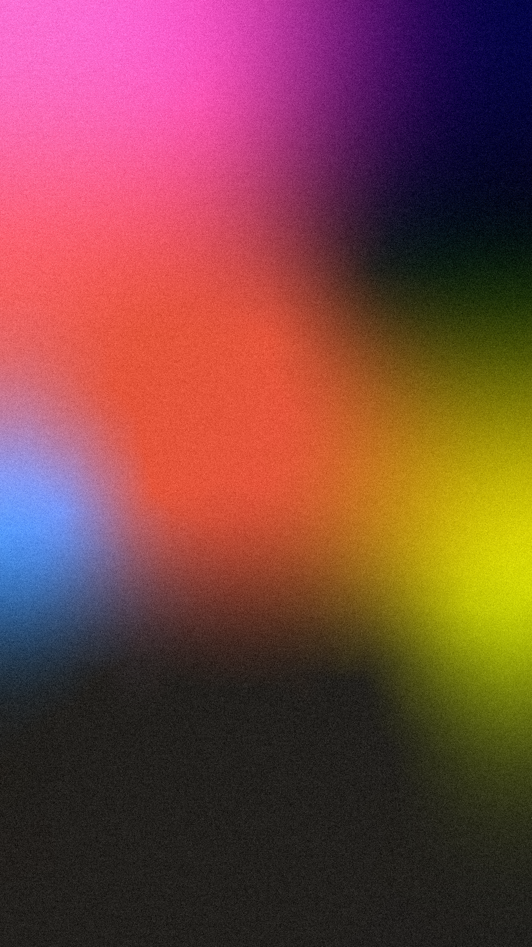 Blurred, colorful abstract background with various shades of pink, purple, blue, orange, green, and black.