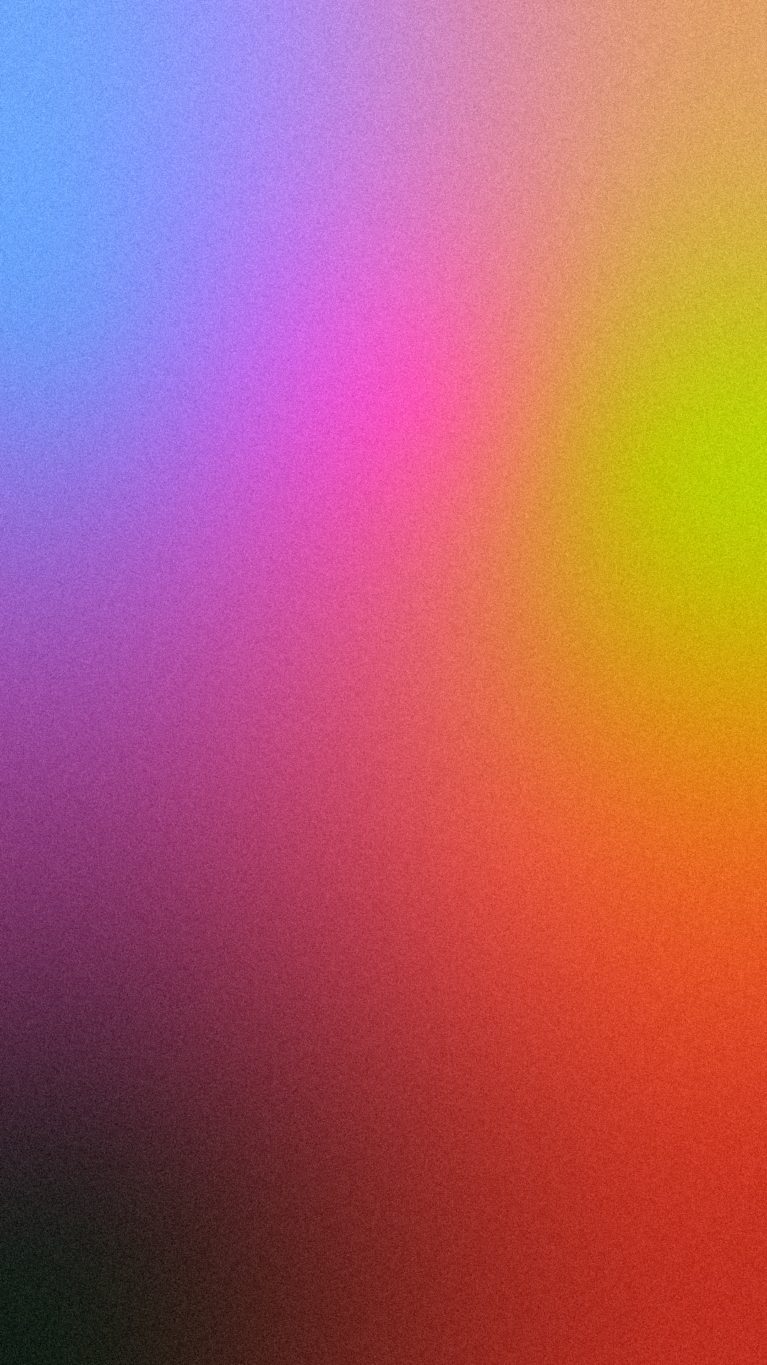 Blurred multicolored abstract background with shades of purple, pink, yellow, orange, and green.