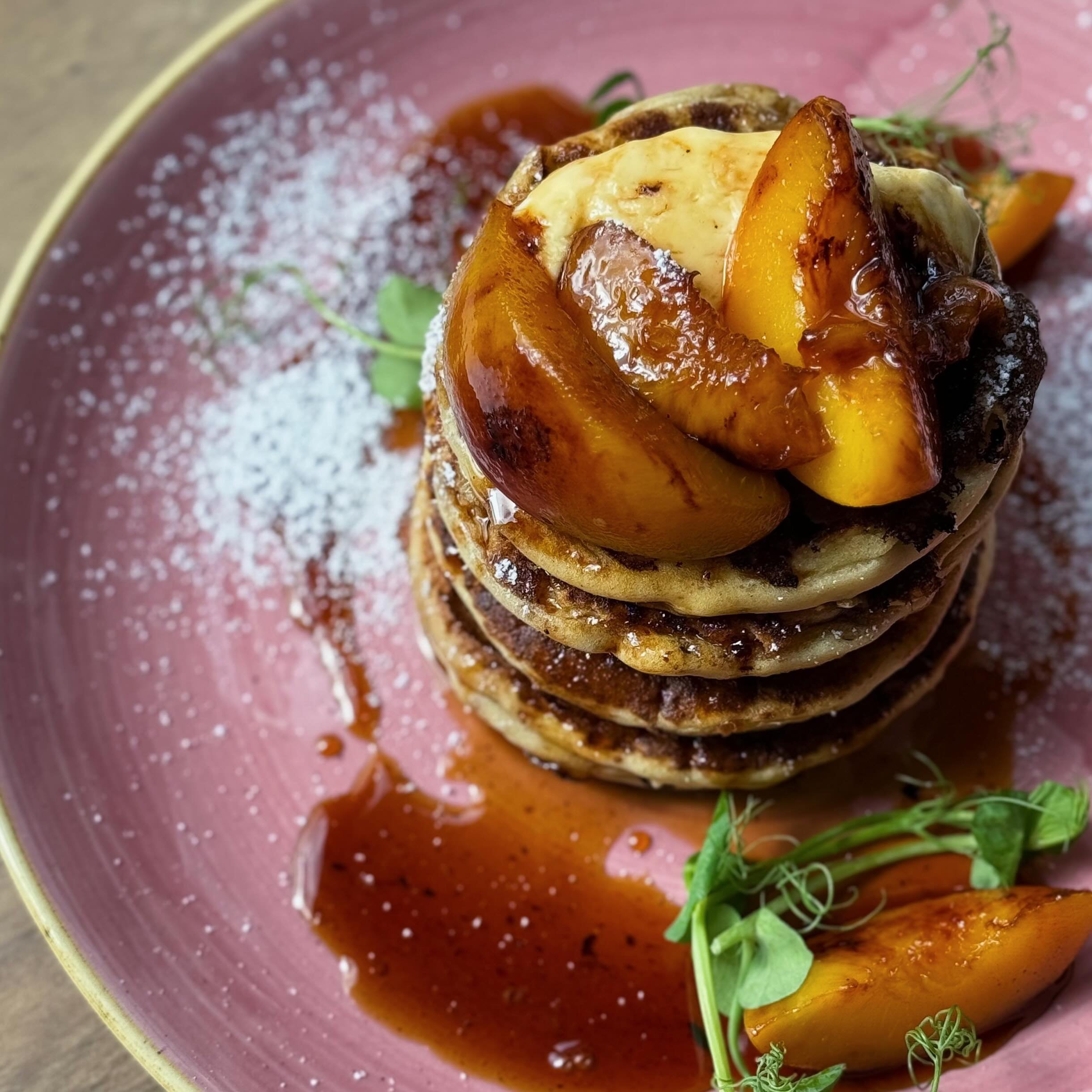 New, improved and back on the menu at The Deli Hylands&hellip; ⁣
Fluffy, homemade, American style pancakes with charred peaches, cinnamon &amp; whipped vanilla mascarpone. Finished with a generous helping of maple syrup 🥞 ⁣
Available all day, every 