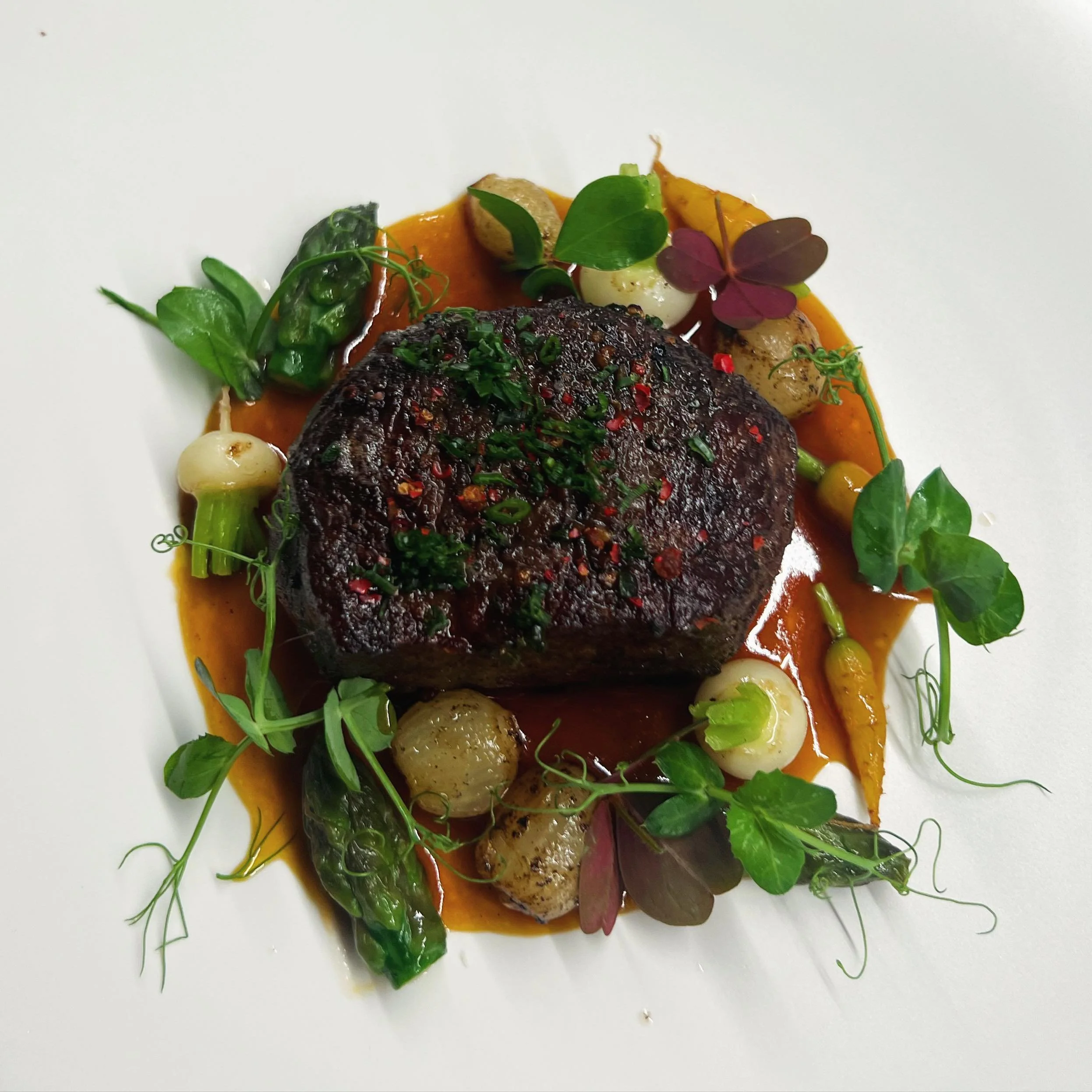 Wagyu Strip Steak, Spring Vegetables, Pink Peppercorn, Bordelaise.