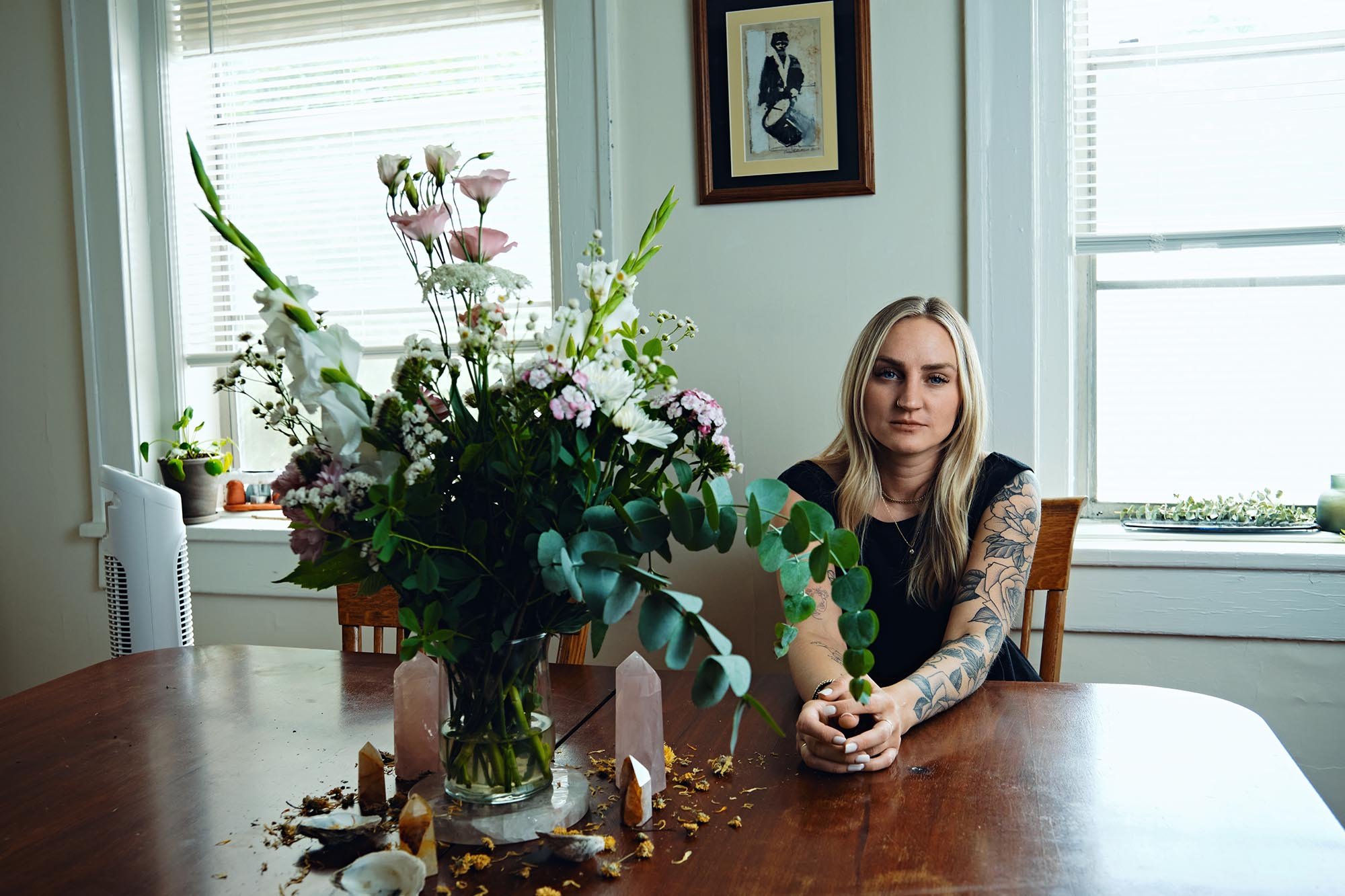 Katie, a former public school teacher, had to find new housing after escaping an abusive partner. Her AC has been broken for over a month during the summer's heat wave.