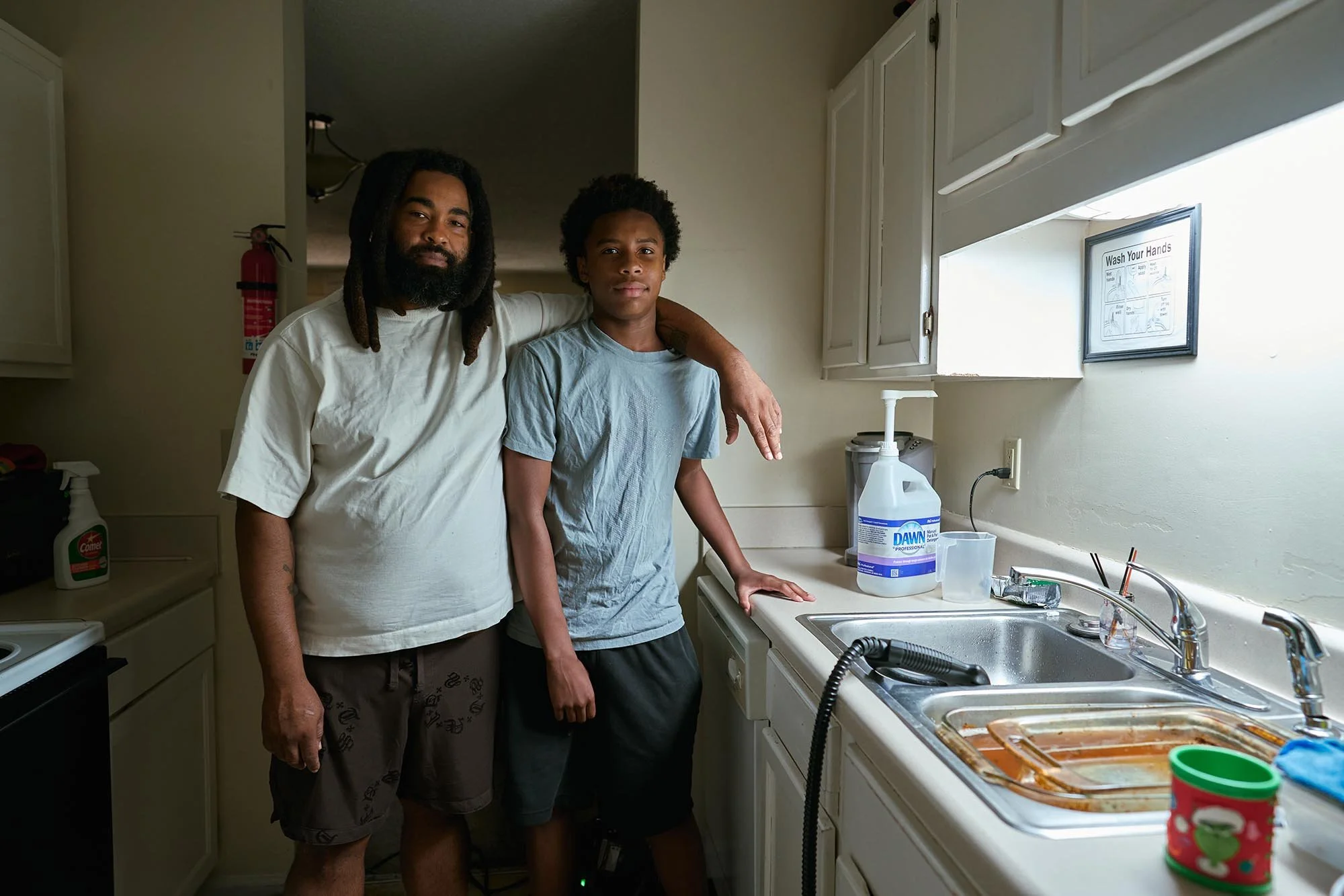 Travis lives in an apartment with his son Omar that costs $1700. He works as an At Home care provider making $34,000 a year. 