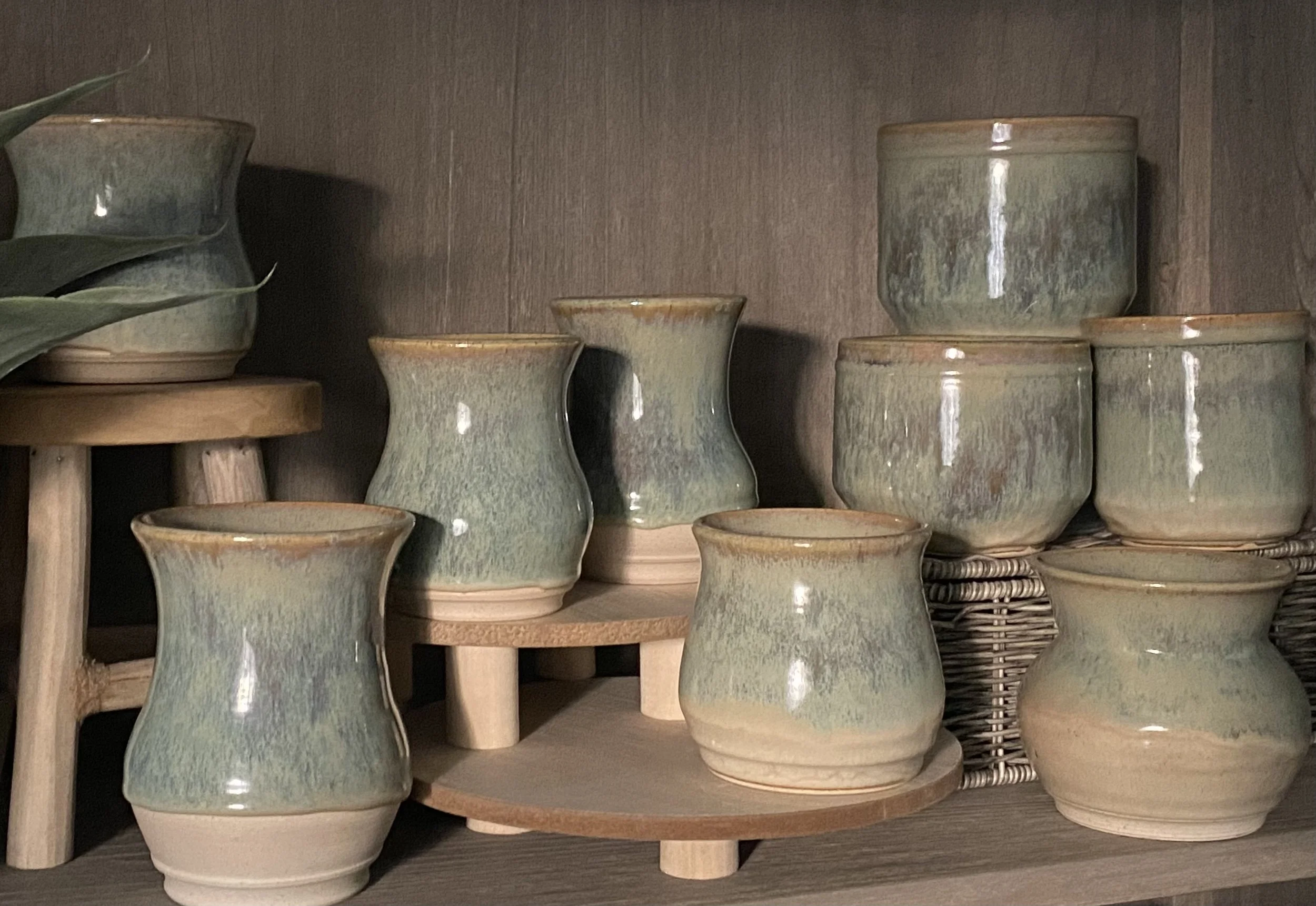 A collection of wheel thrown pots in matching glazes