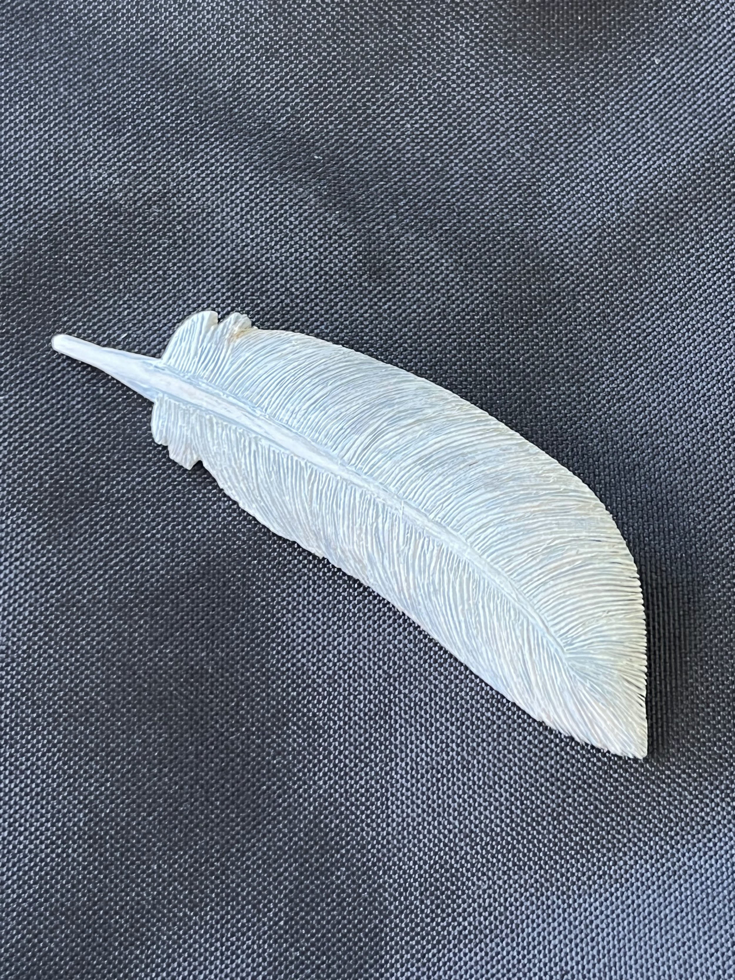 Ted Richmond feather pin unpainted.jpg