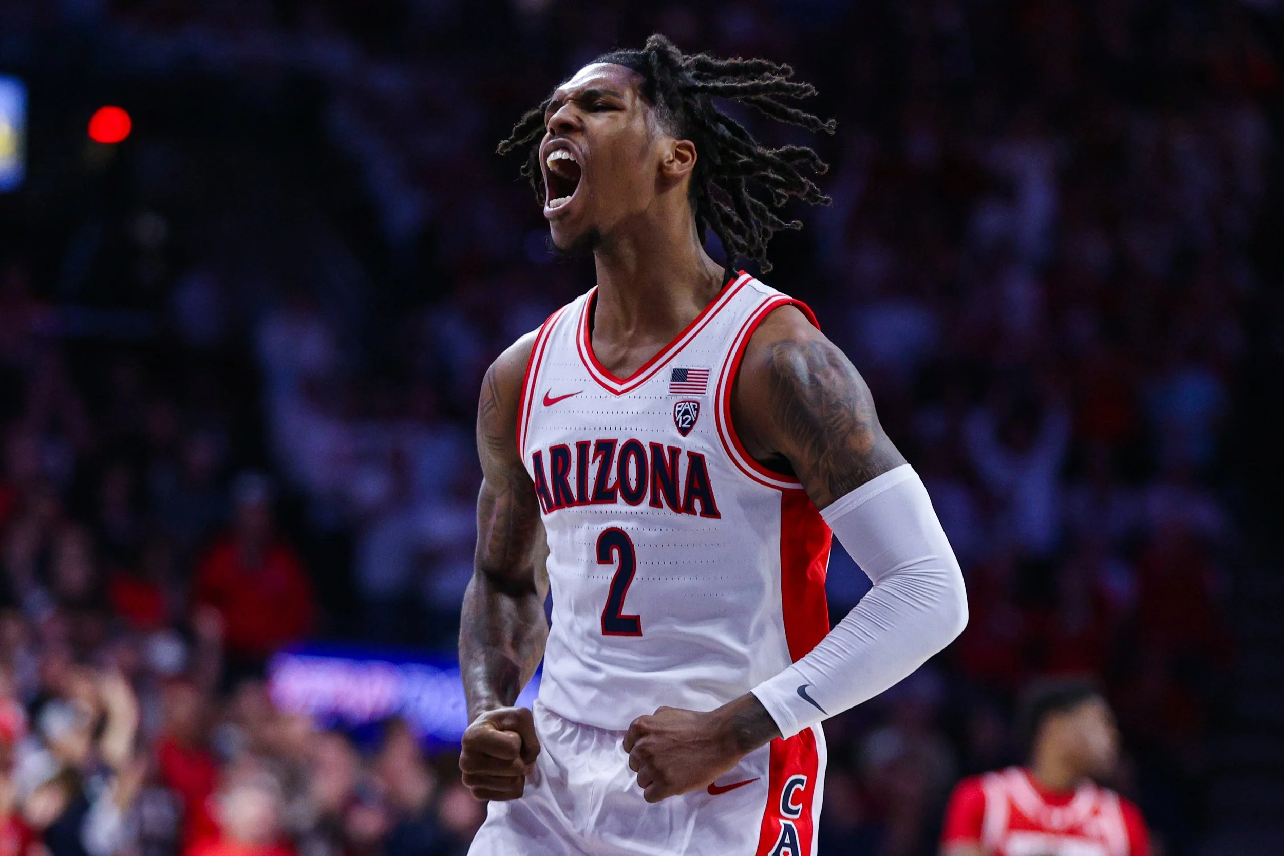 Caleb Williams of Arizona Wildcats Basketball celebrates a score in McKale Center in Tucson, Arizona.